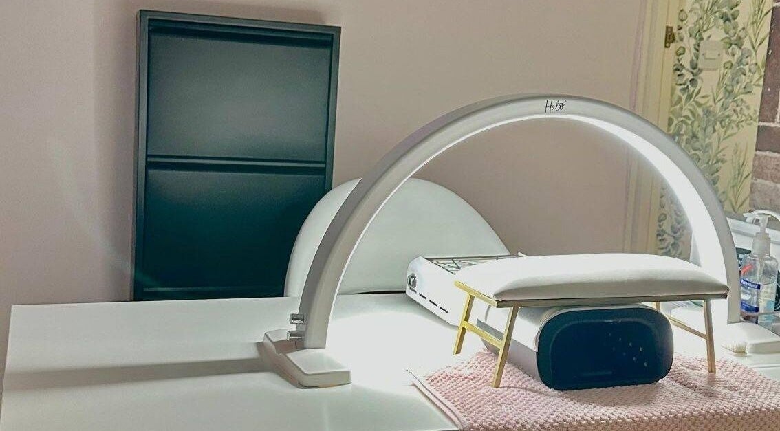 Elegant nail station at Dragonfly Beauty, South Hiendley, England, GB, featuring modern lighting and cozy setup.