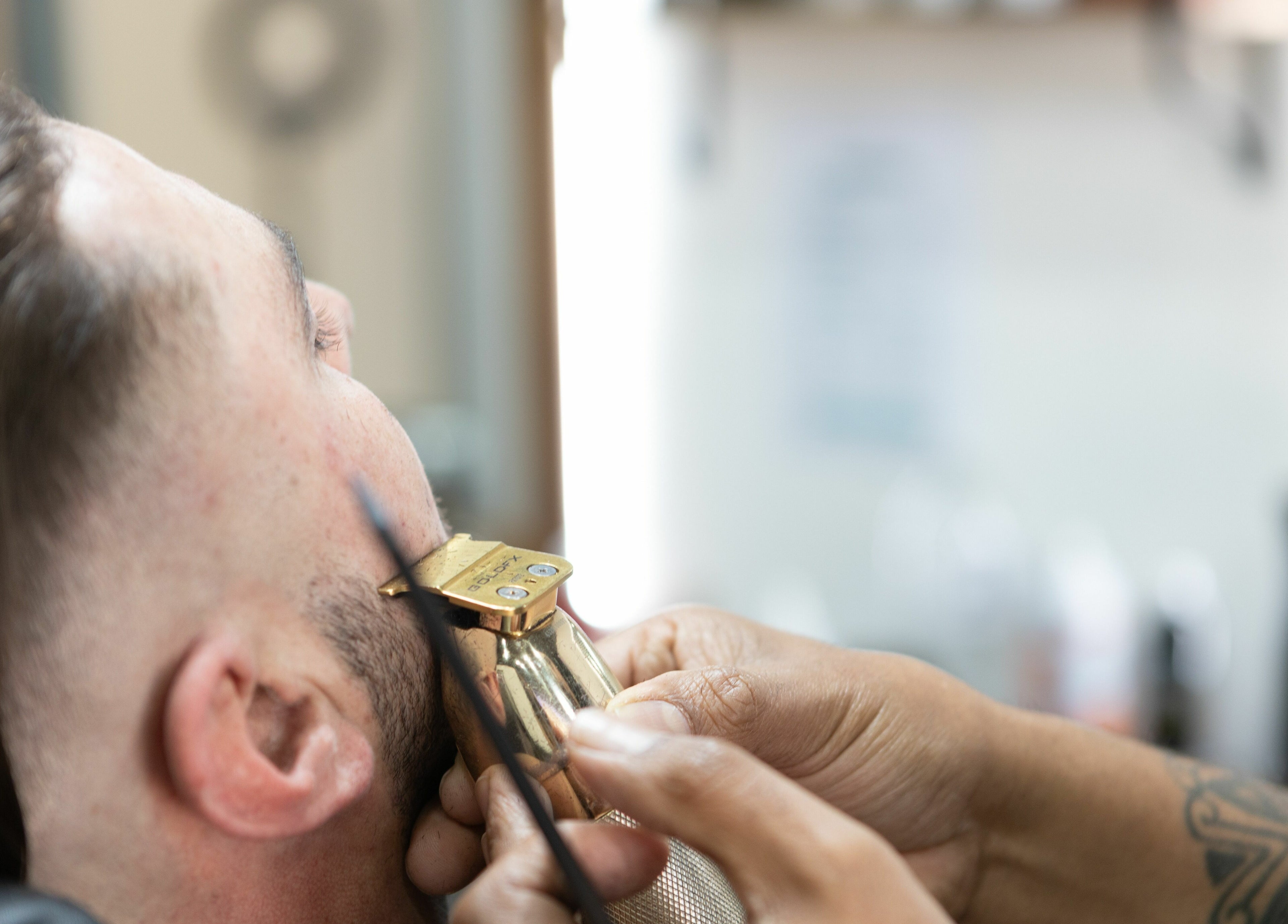 Close-up of a precise haircut at Collective Hair in Mascot, Pensioners 25% Off, AU.