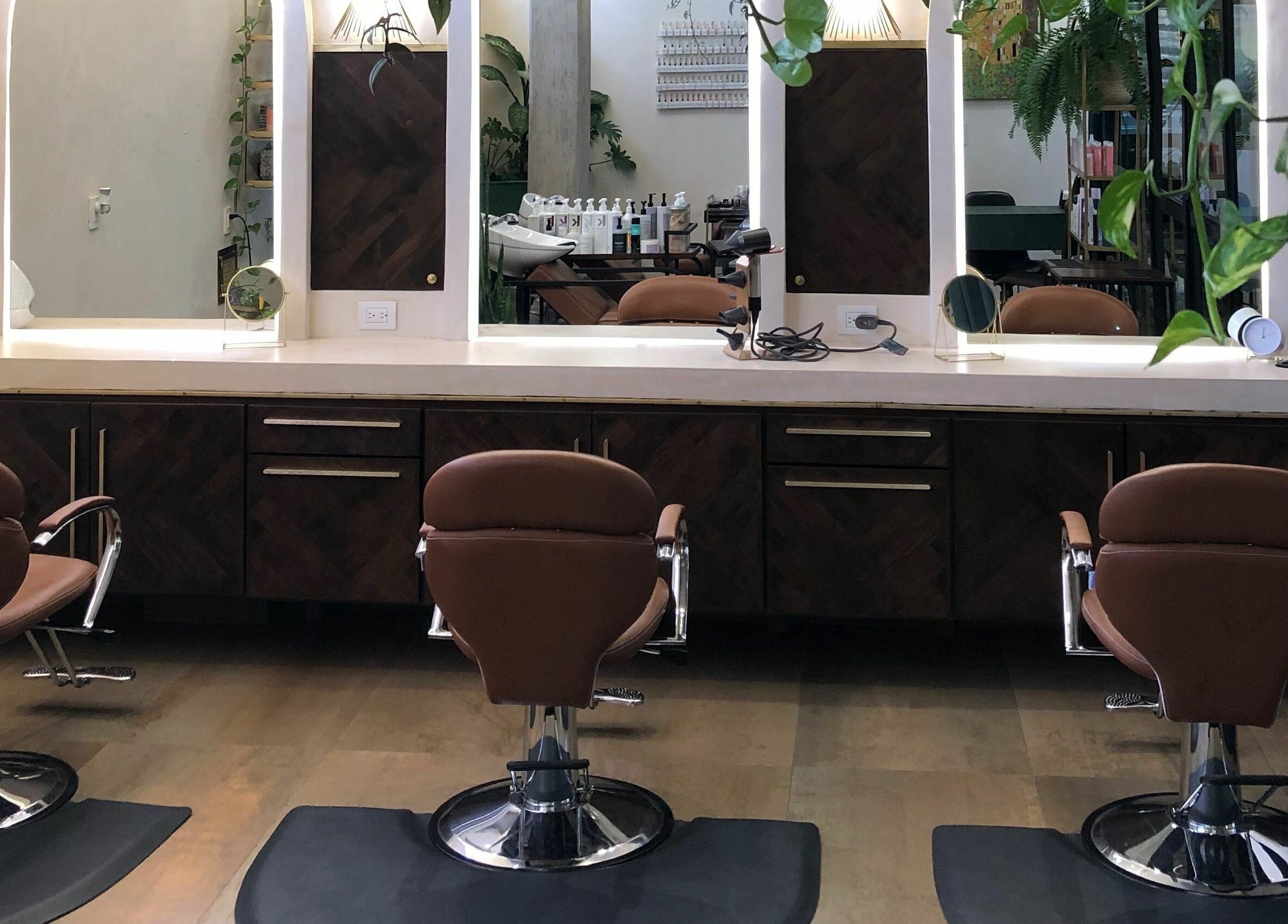 Stylish salon chairs and mirrors at Salon 144 in Cabo San Lucas, Baja California Sur, MX.