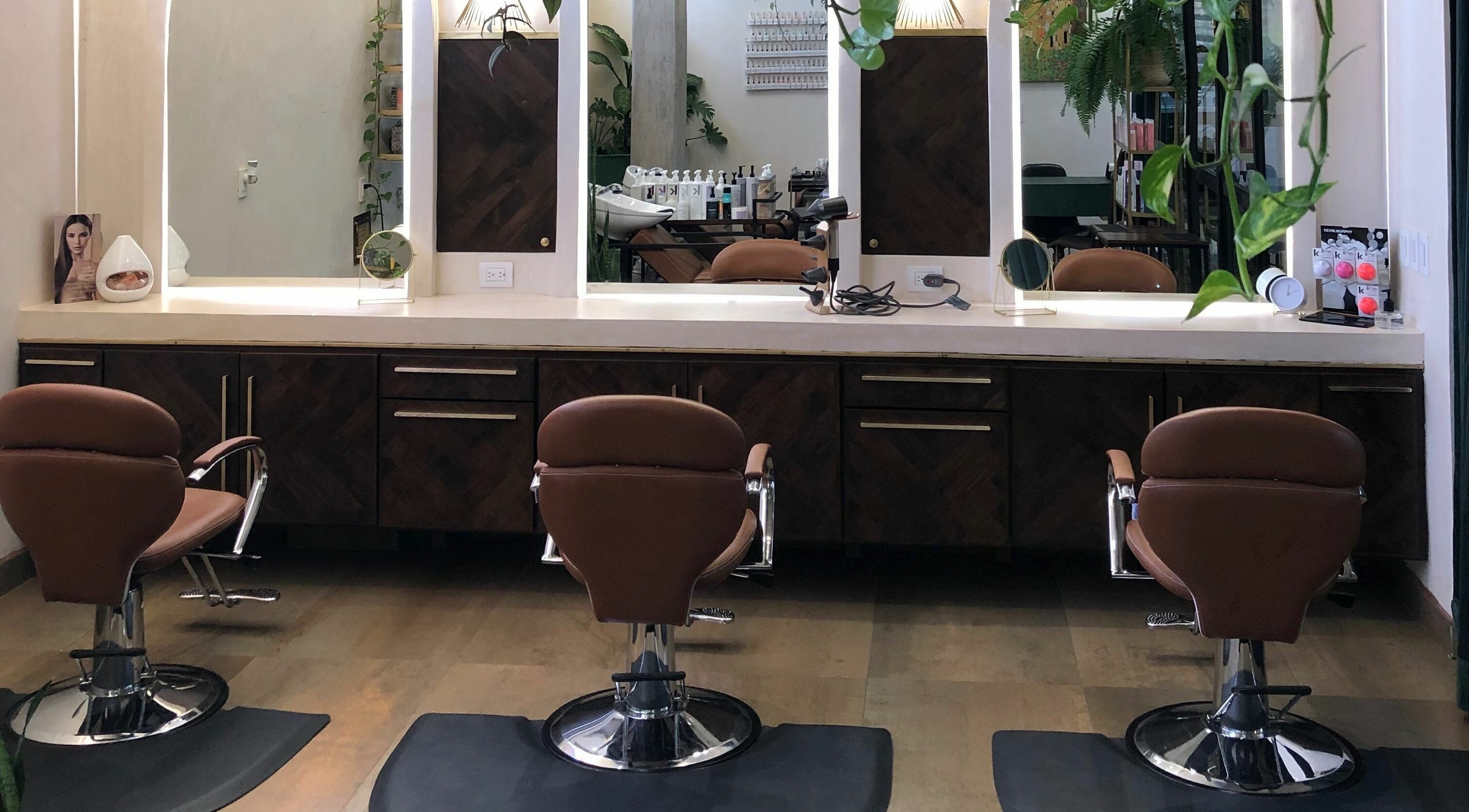 Stylish salon chairs and mirrors at Salon 144 in Cabo San Lucas, Baja California Sur, MX.