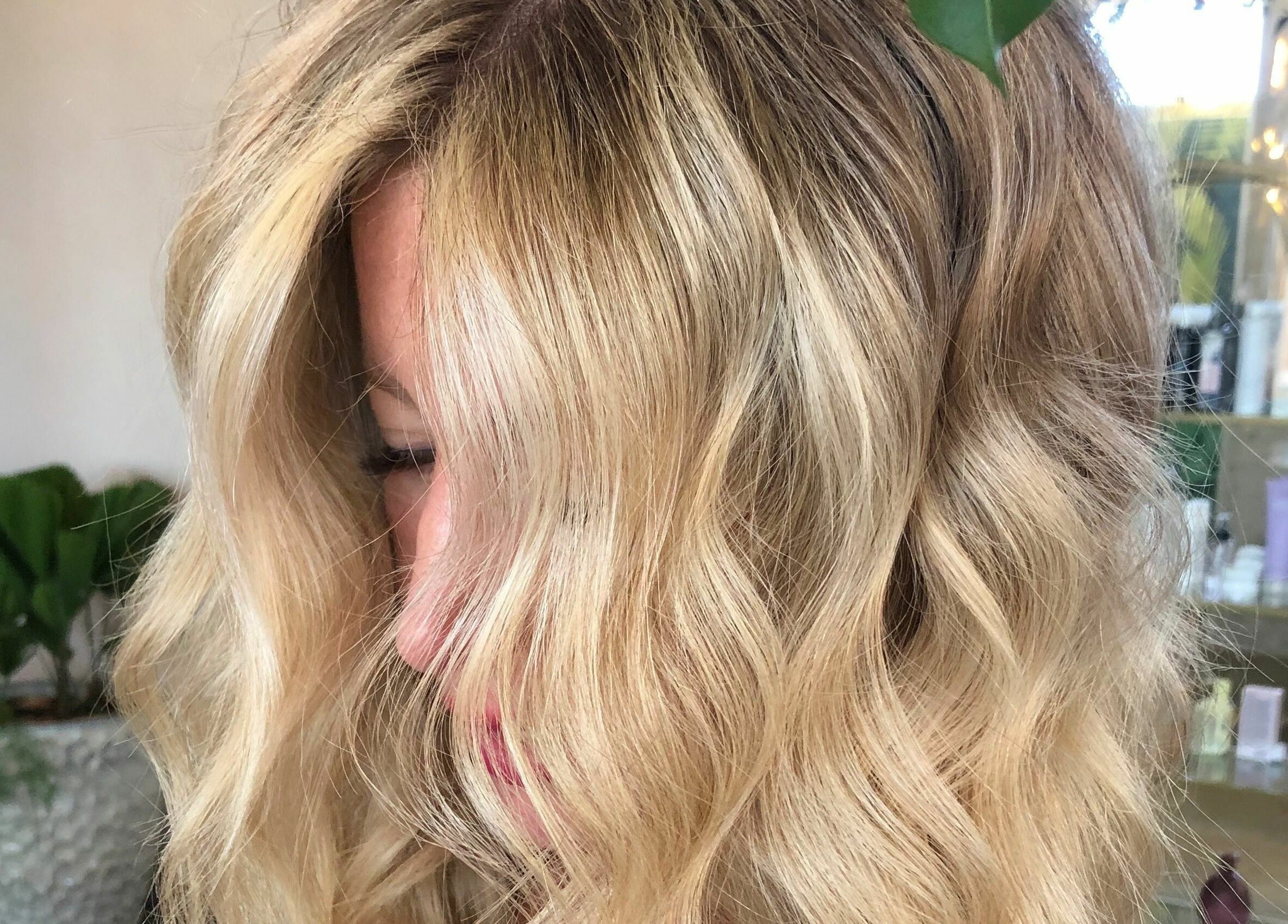 Blonde hair styled with beachy waves at Salon 144, Cabo San Lucas, Baja California Sur, MX.