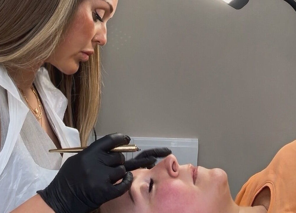 Aesthetician at Nm Skin And Beauty performing a facial treatment. Located by Invergordon, Scotland, GB.