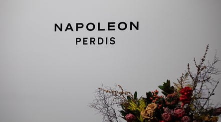 Coming Soon - Napoleon Perdis Carindale at David Jones, Robina, Queensland, AU, with elegant floral arrangement.