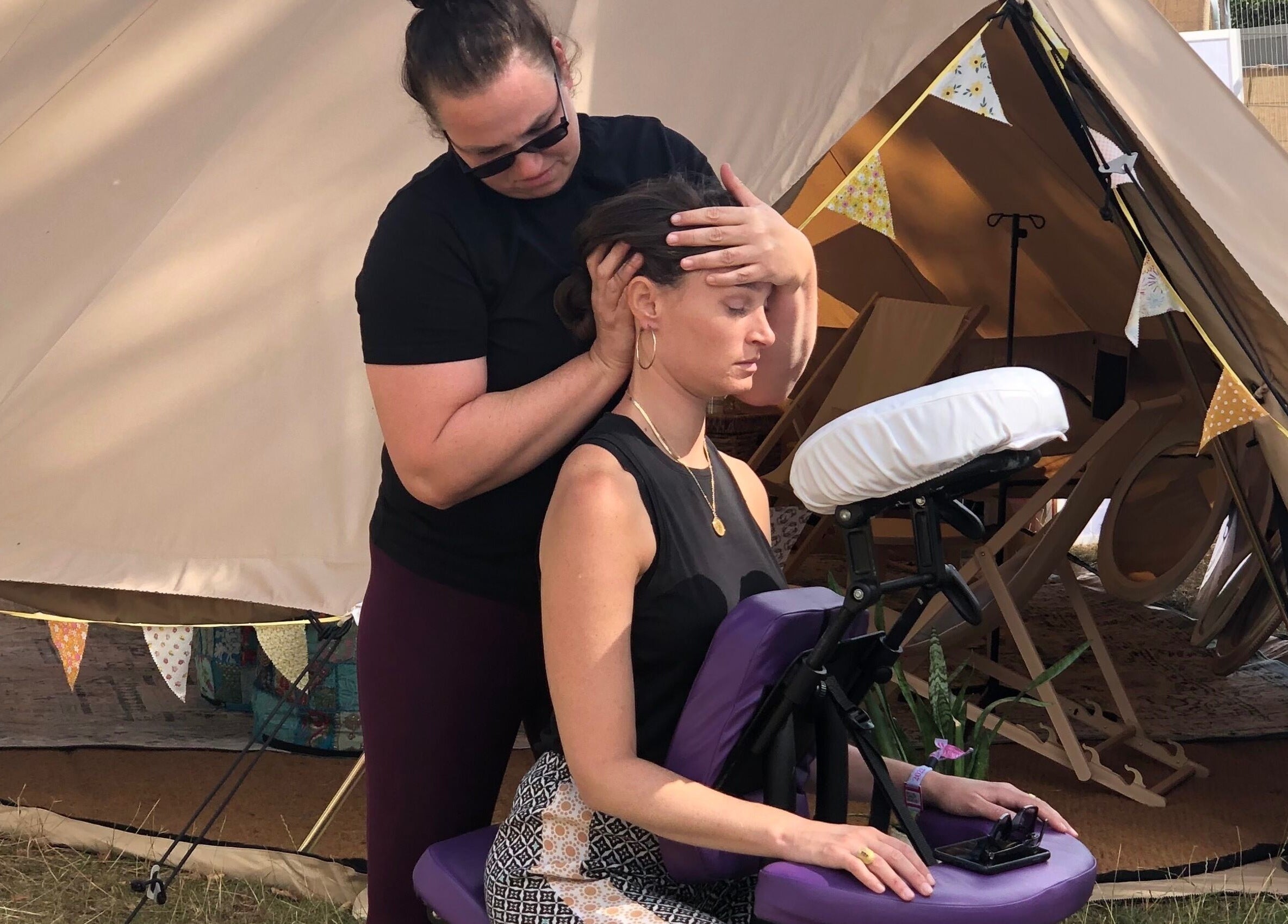 Relaxing massage at Latitude Luxury tent in Southwold, England, GB. Experience premium wellness outdoors.