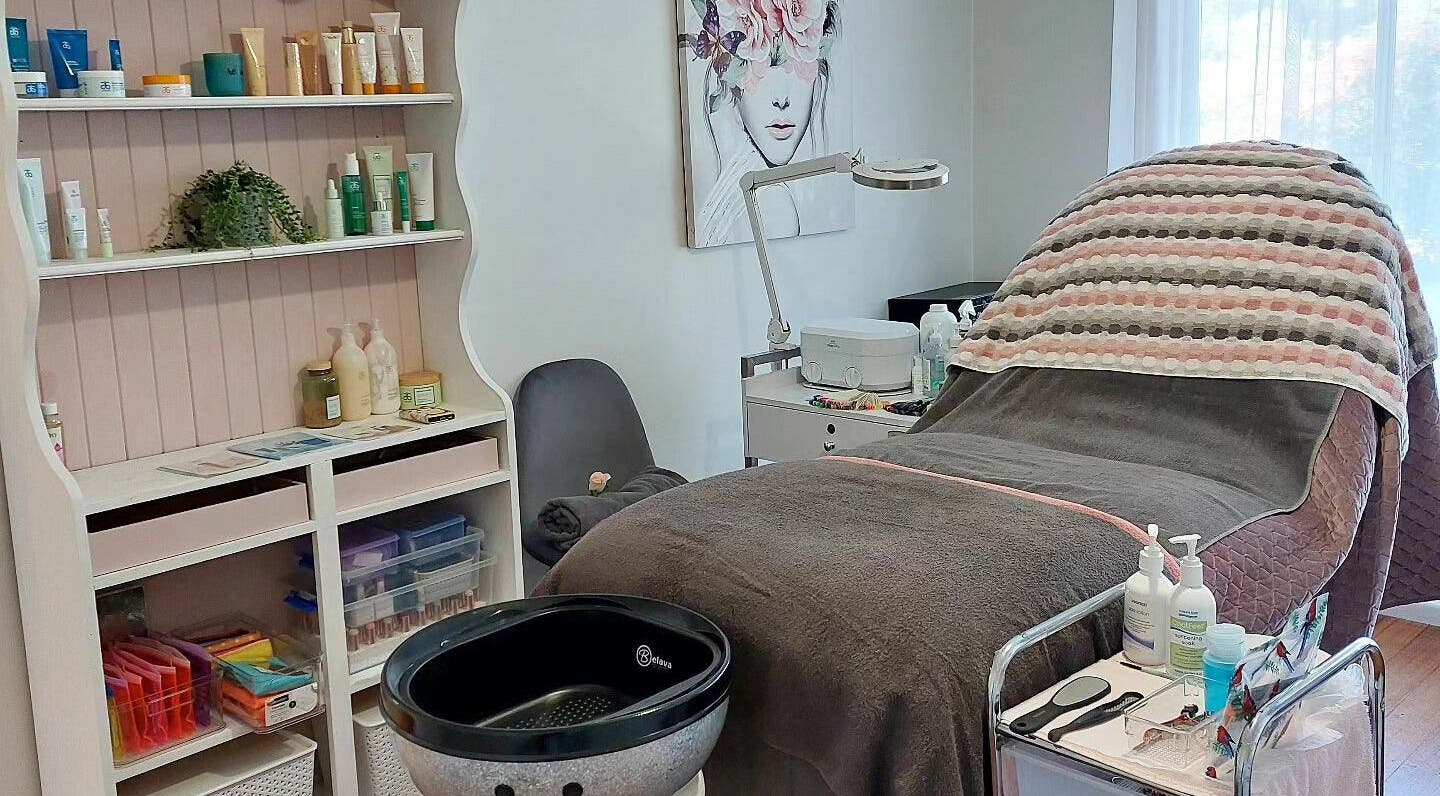 Relaxing spa room at Revive Massage and Beauty Romsey, Romsey, Victoria, AU, showcasing a cozy massage bed.