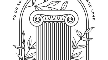 Elegant column illustration with leaves at Salon Meraki in Wadesboro, North Carolina, US.