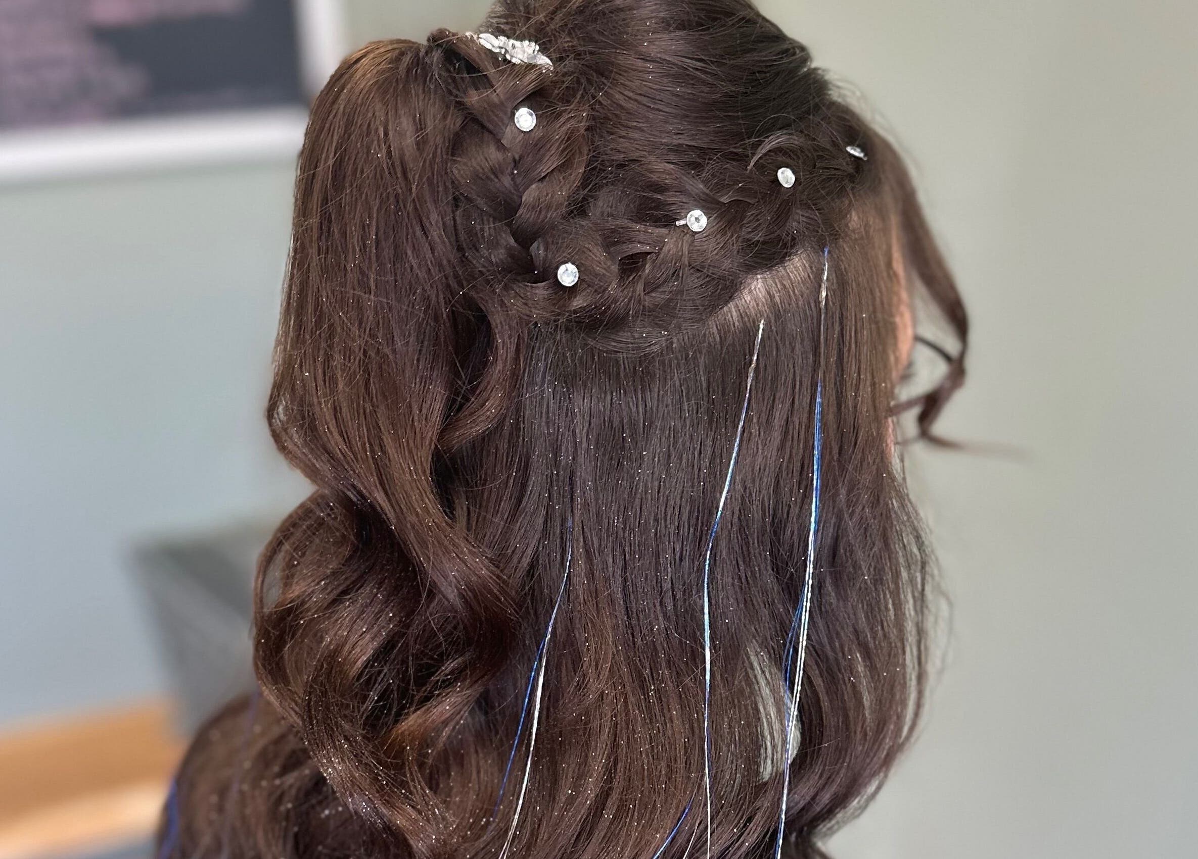 Elegant braided hairstyle with accessories at Sparkling Style - Meraki, Olds, Alberta, CA.