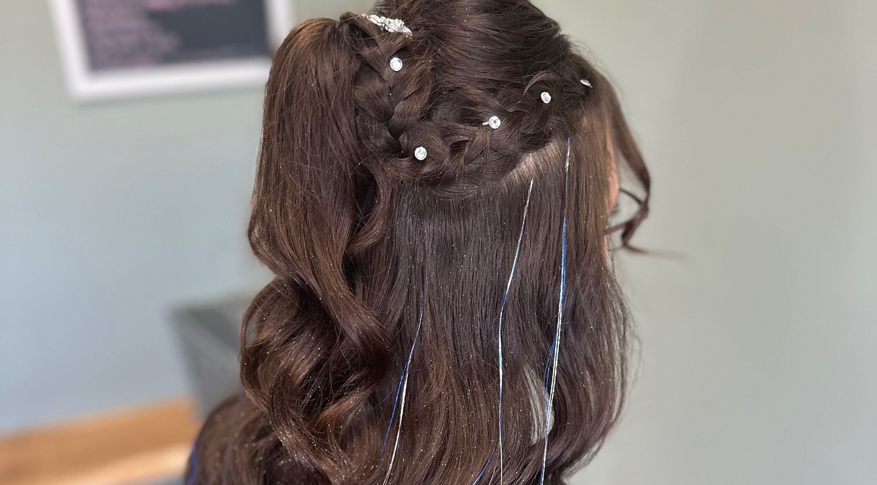 Elegant braided hairstyle with accessories at Sparkling Style - Meraki, Olds, Alberta, CA.