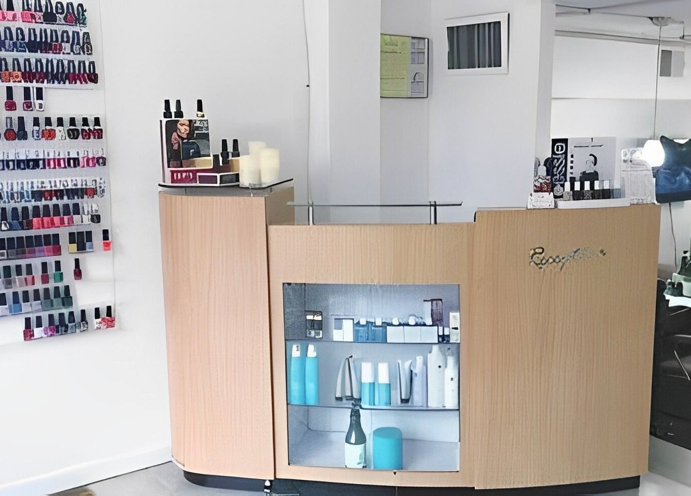 Colorful nail polish display at Sofia Nails & Spa, Newton, Massachusetts, US.