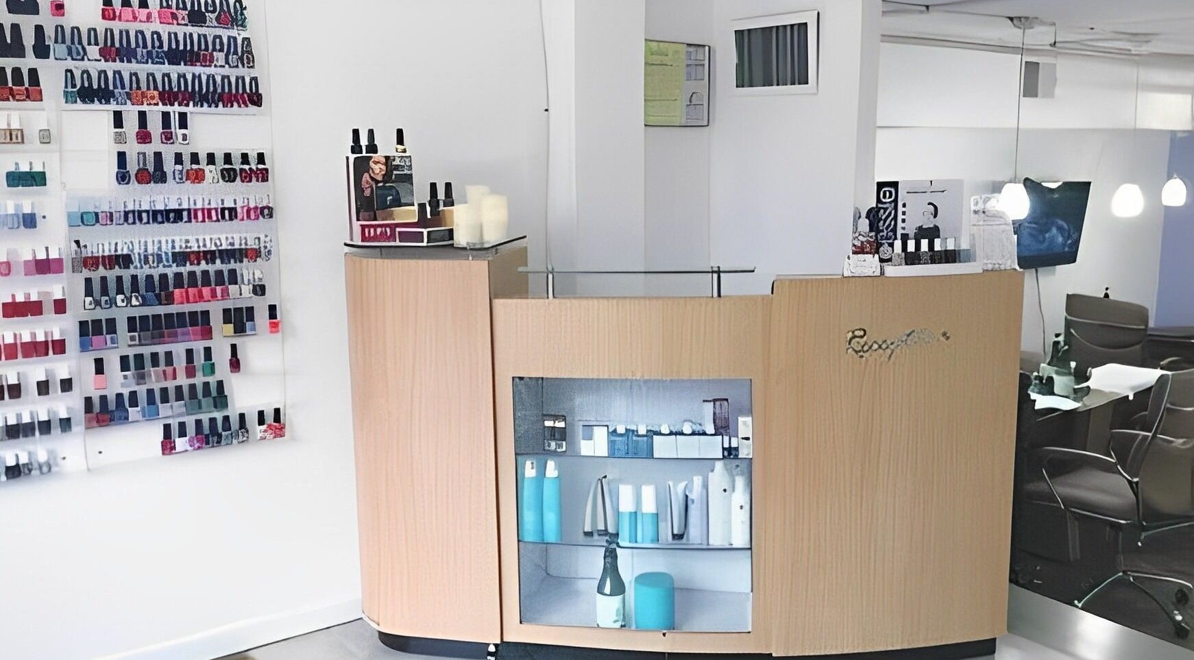 Colorful nail polish display at Sofia Nails & Spa, Newton, Massachusetts, US.