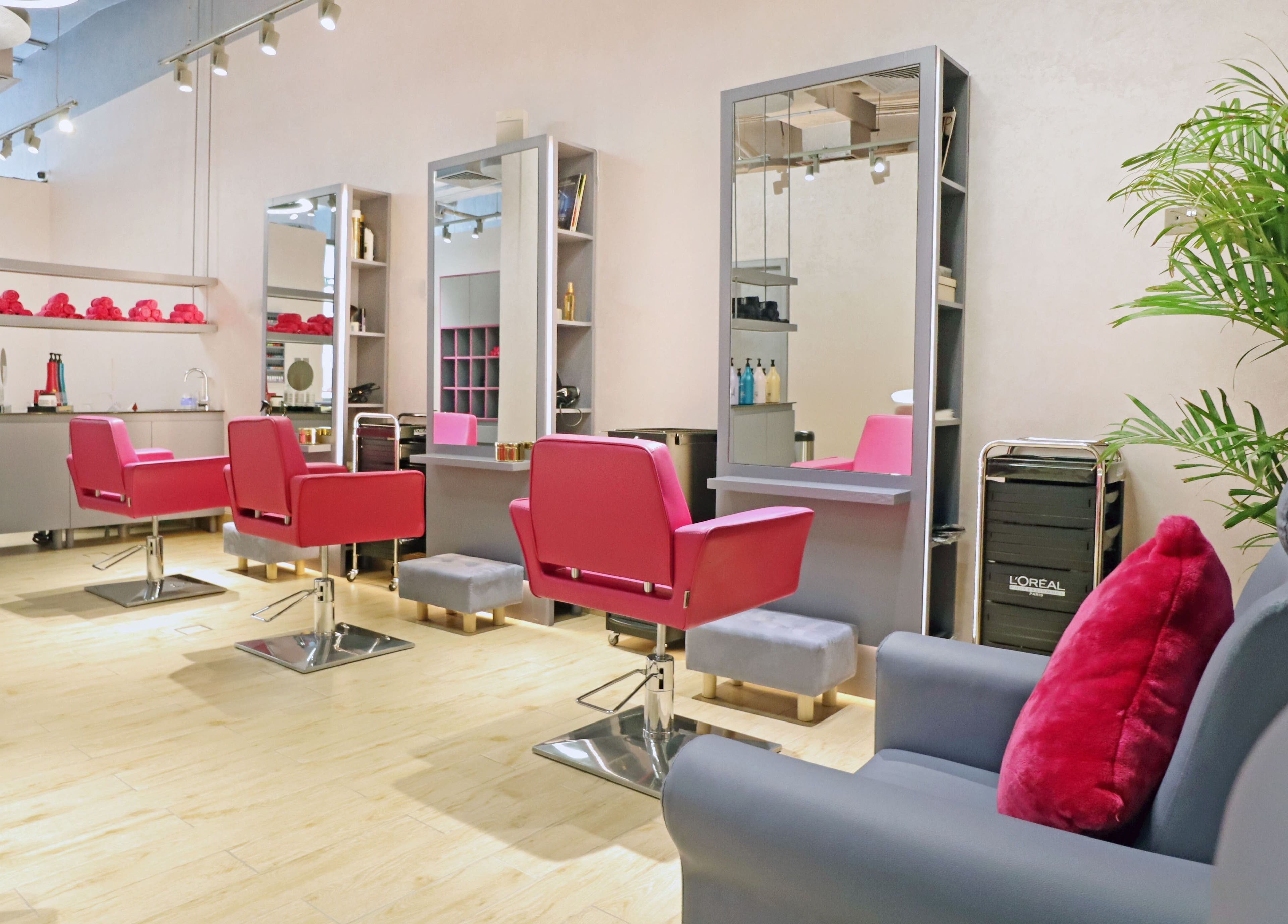 Elegant salon chairs at Mastercuts UAE, Dubai, Dubai, AE, offering a stylish aesthetic for beauty and wellness.