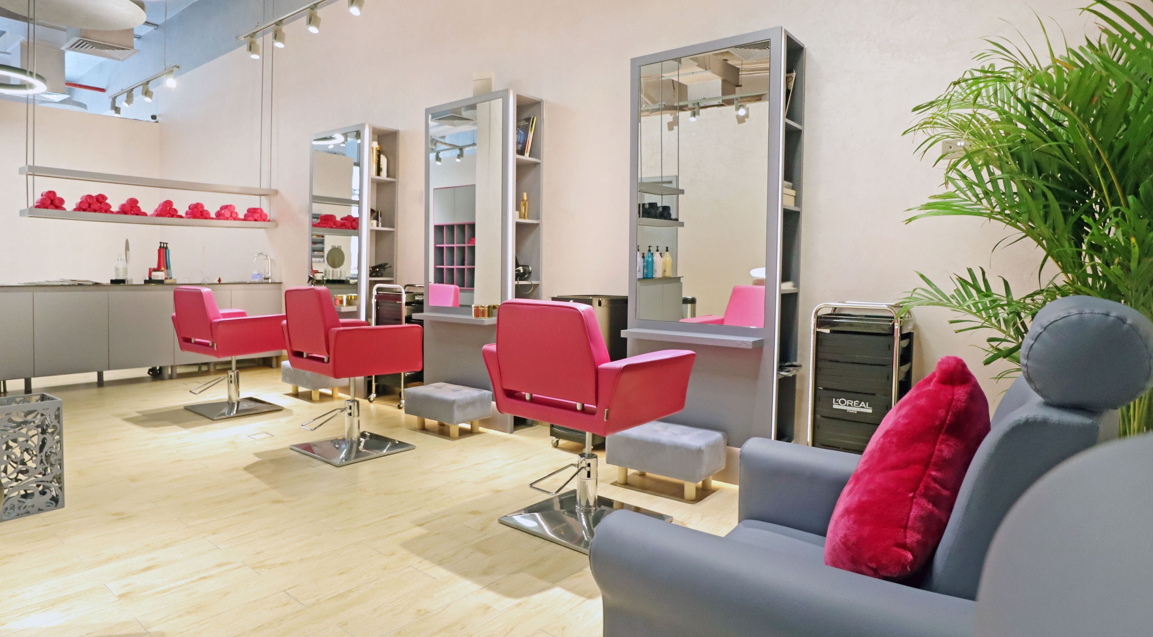 Elegant salon chairs at Mastercuts UAE, Dubai, Dubai, AE, offering a stylish aesthetic for beauty and wellness.