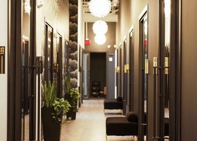 Stylish hallway at Katie Image Studios #125 in Lee's Summit, Missouri, US with modern design and seating.