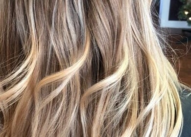 Close-up of styled blonde hair at Katie Image Studios #125 in Lee's Summit, Missouri, US.