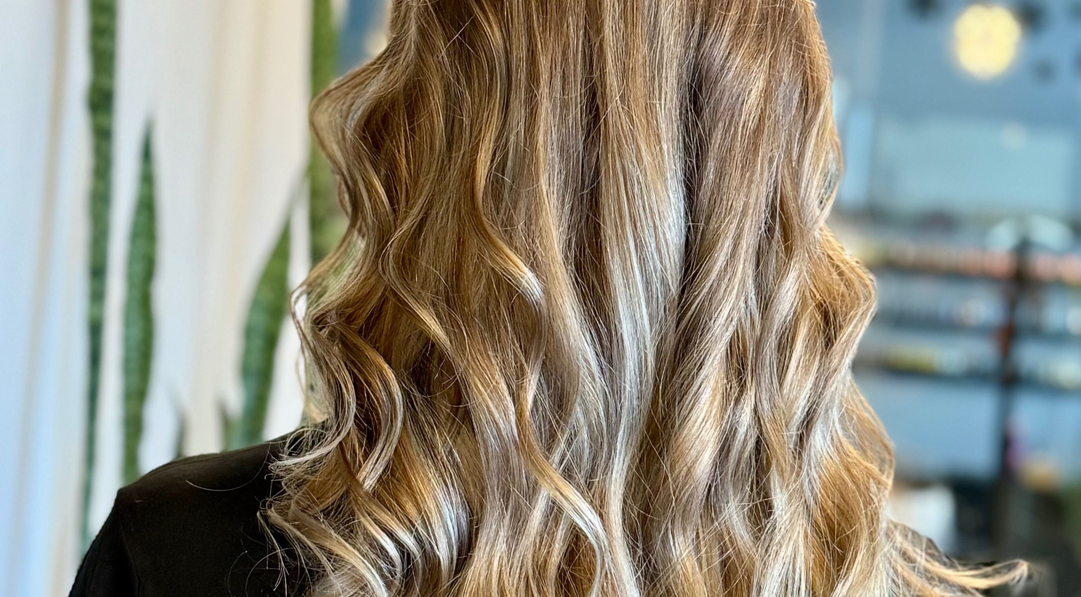Elegant wavy hairstyle by Katie at Salon Nuvo in Lee’s Summit, Missouri, US.