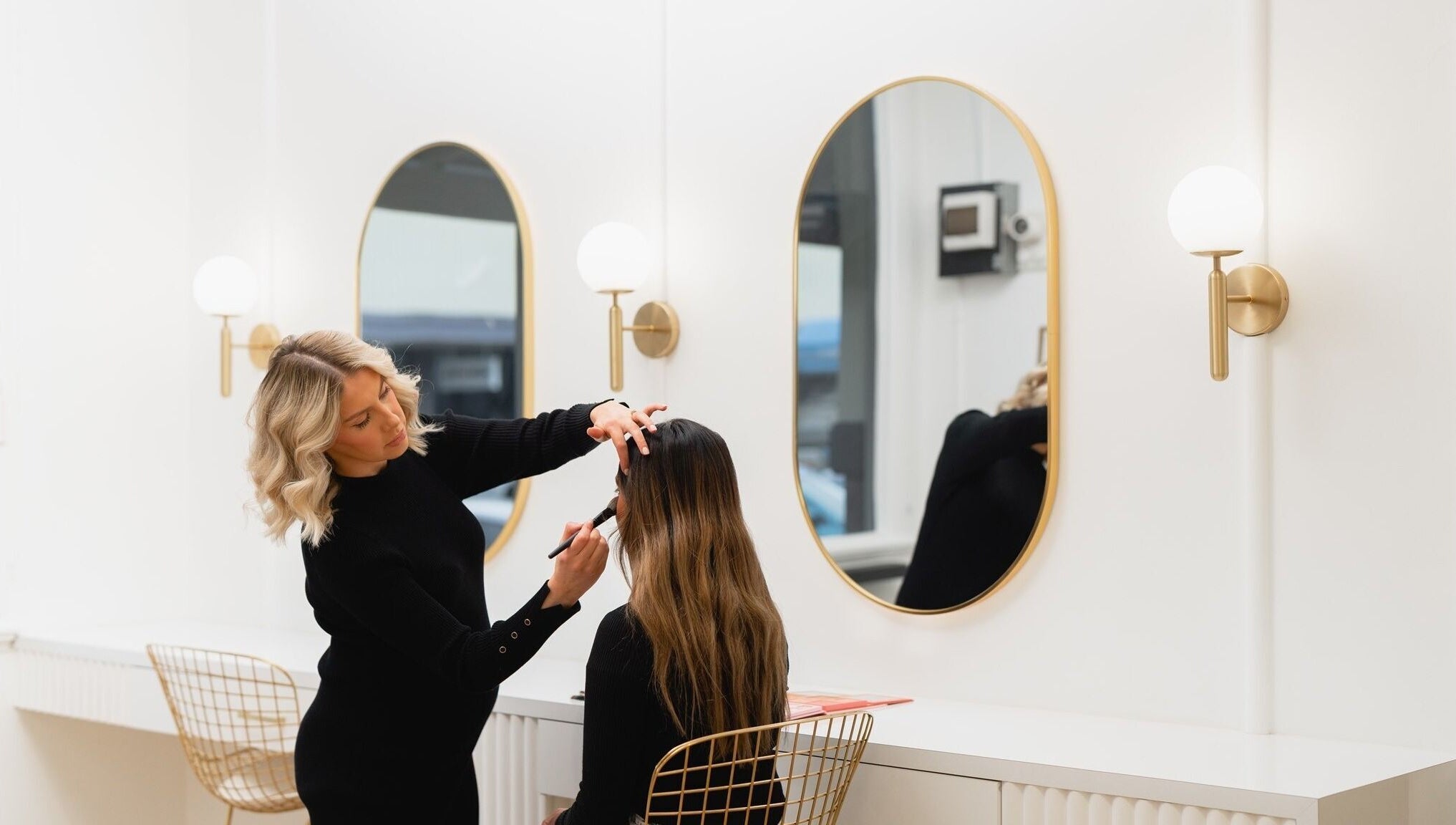 Makeup artist styling at The Glow Lab, Wagga Wagga, New South Wales, AU, in modern, elegant environment.