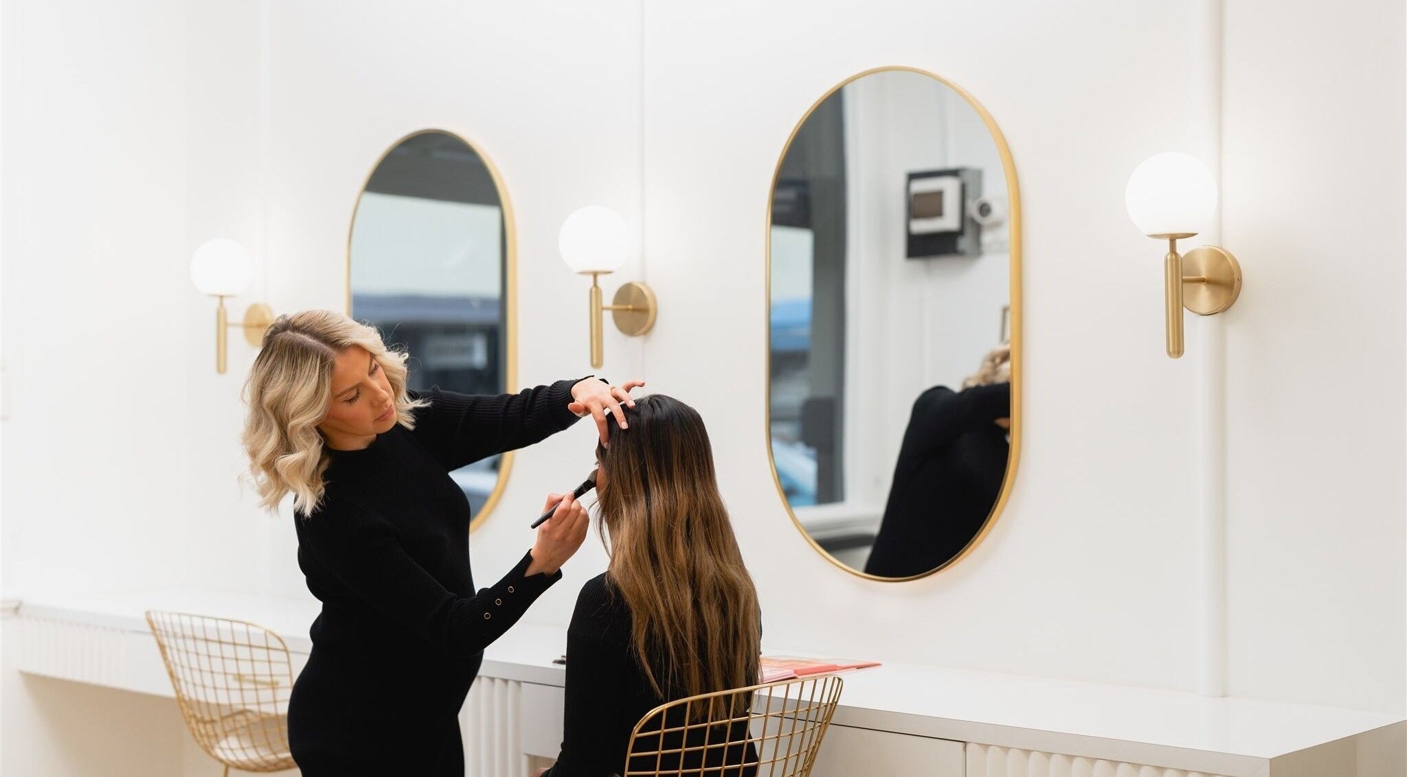 Makeup artist styling at The Glow Lab, Wagga Wagga, New South Wales, AU, in modern, elegant environment.