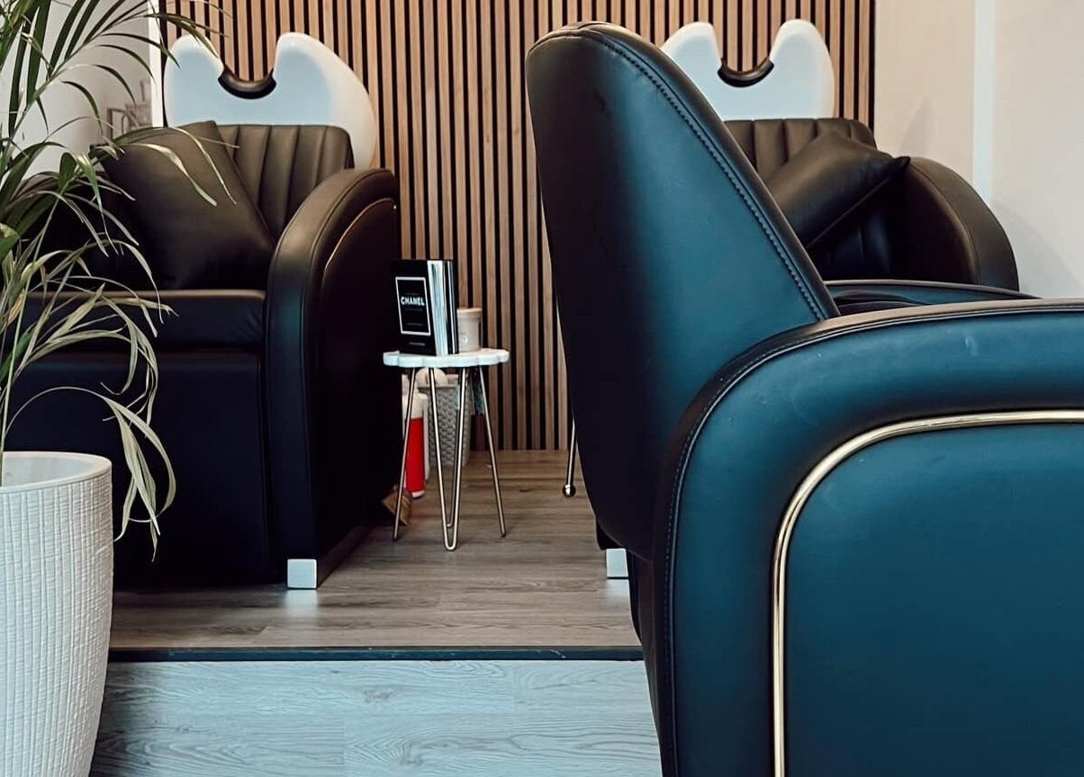 Luxurious seating area at Chelsea Geddes Hair, Peel, Peel, IM offering comfort in a stylish setting.