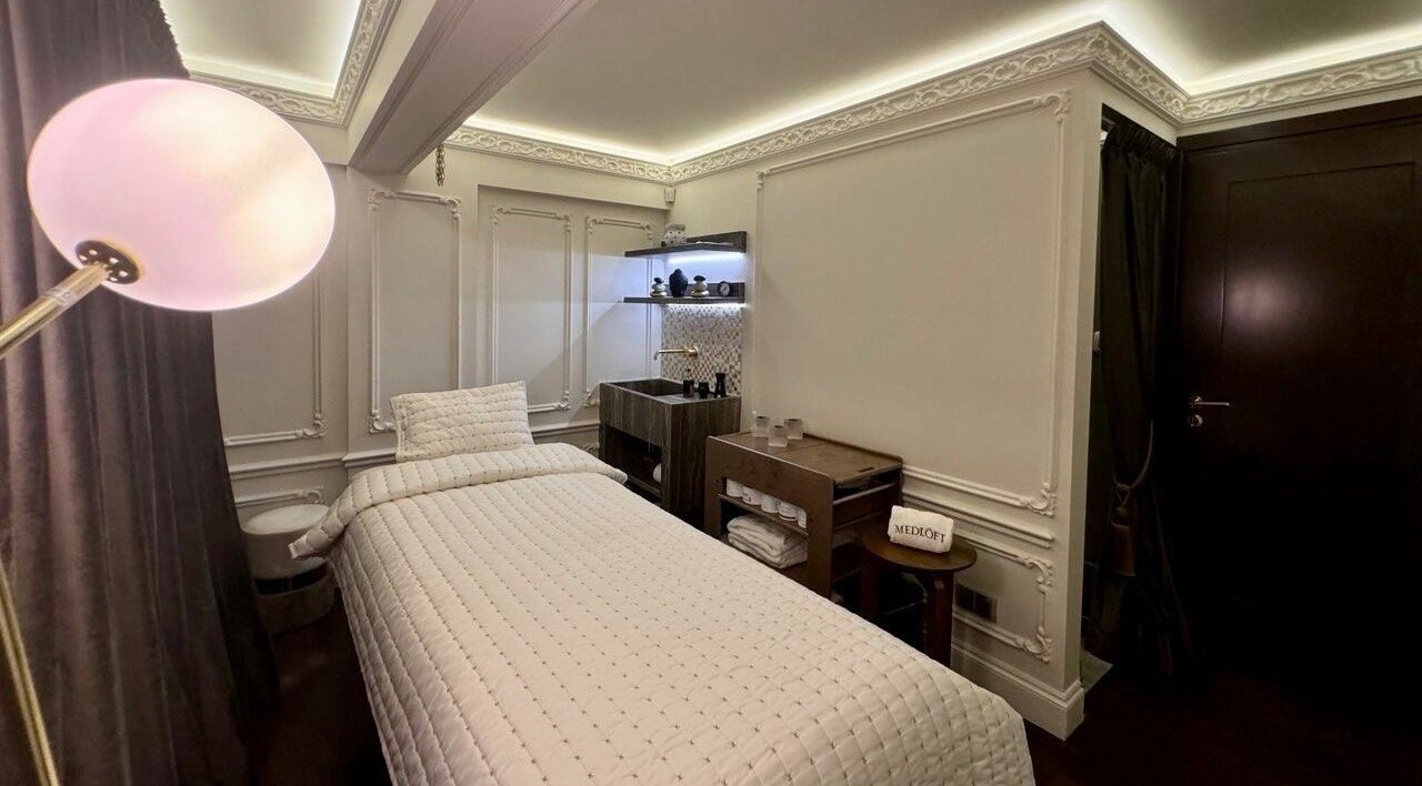 Elegant spa treatment room at Medloft Beauty Couture, Limassol, Limassol, CY featuring plush bedding and subtle lighting.
