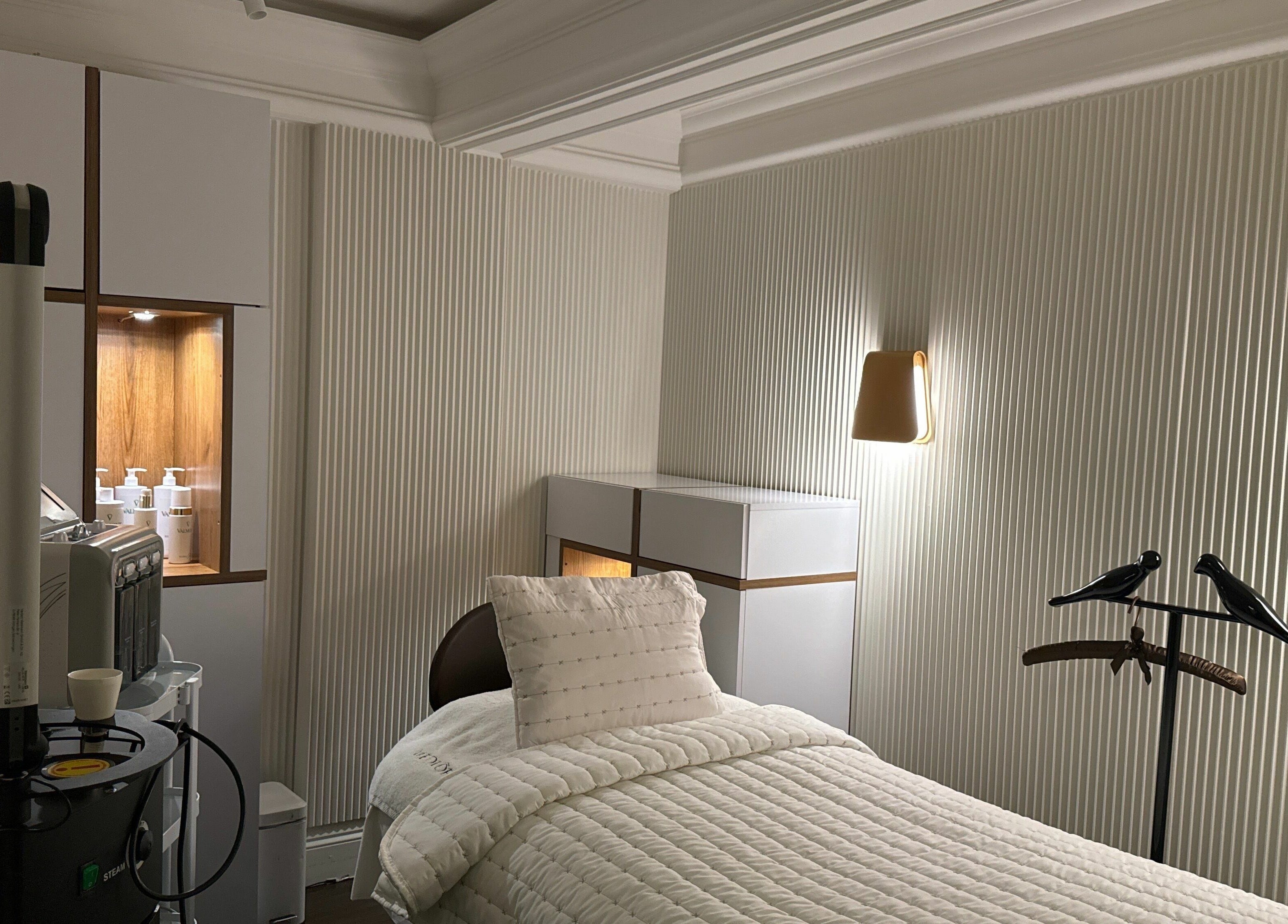 Luxurious treatment room at Medloft Beauty Couture, Limassol, Cyprus with elegant decor and comfortable bed.