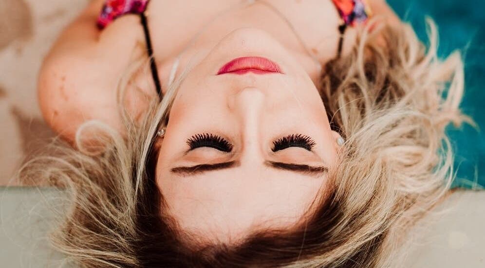 Relaxed woman enjoying beauty care at Bianca Moss, Fairfield, California, US.