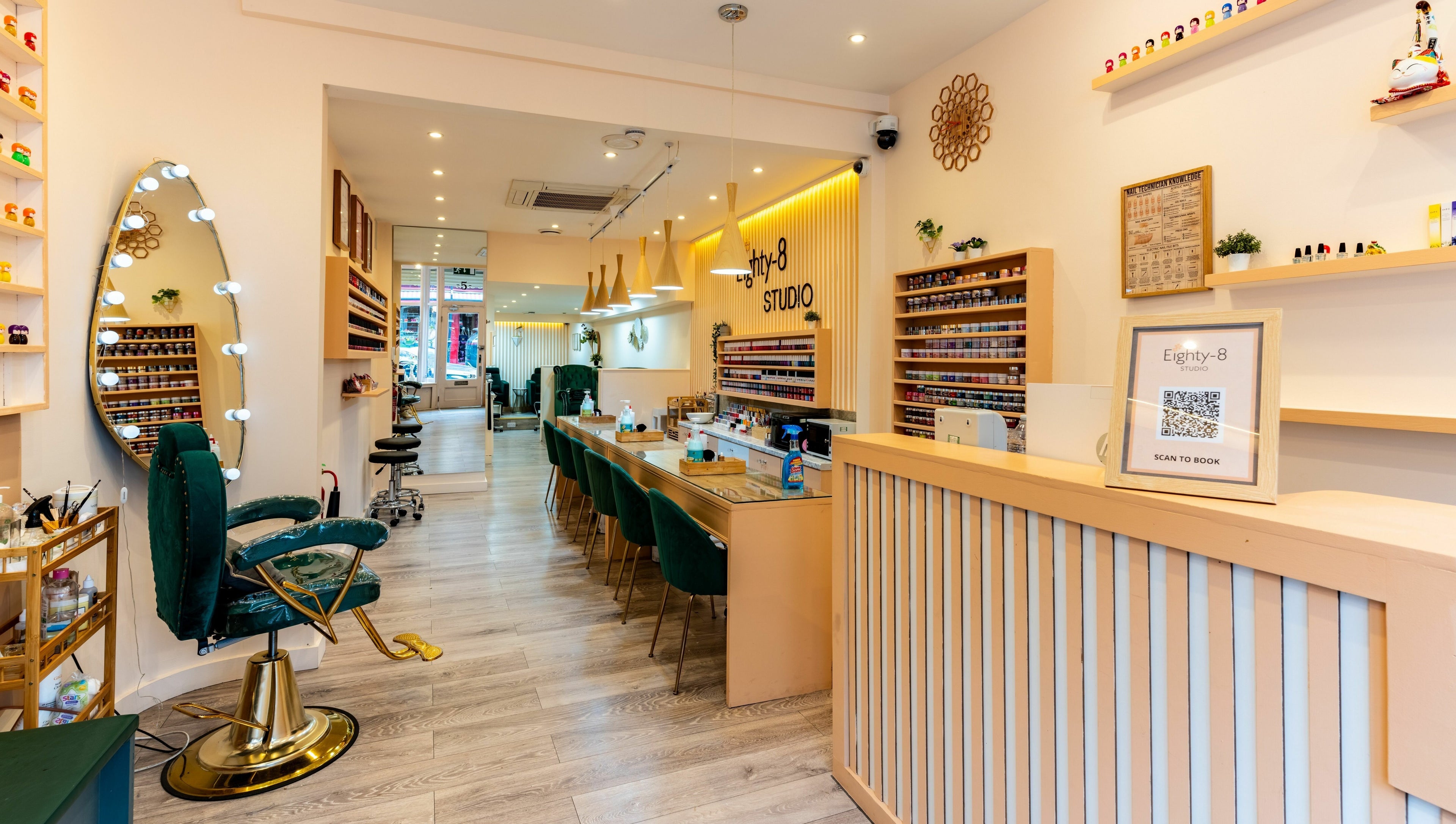 Modern interior of Eighty-8 Notting Hill, London, England, GB showcasing elegant nail bar and vibrant decor.