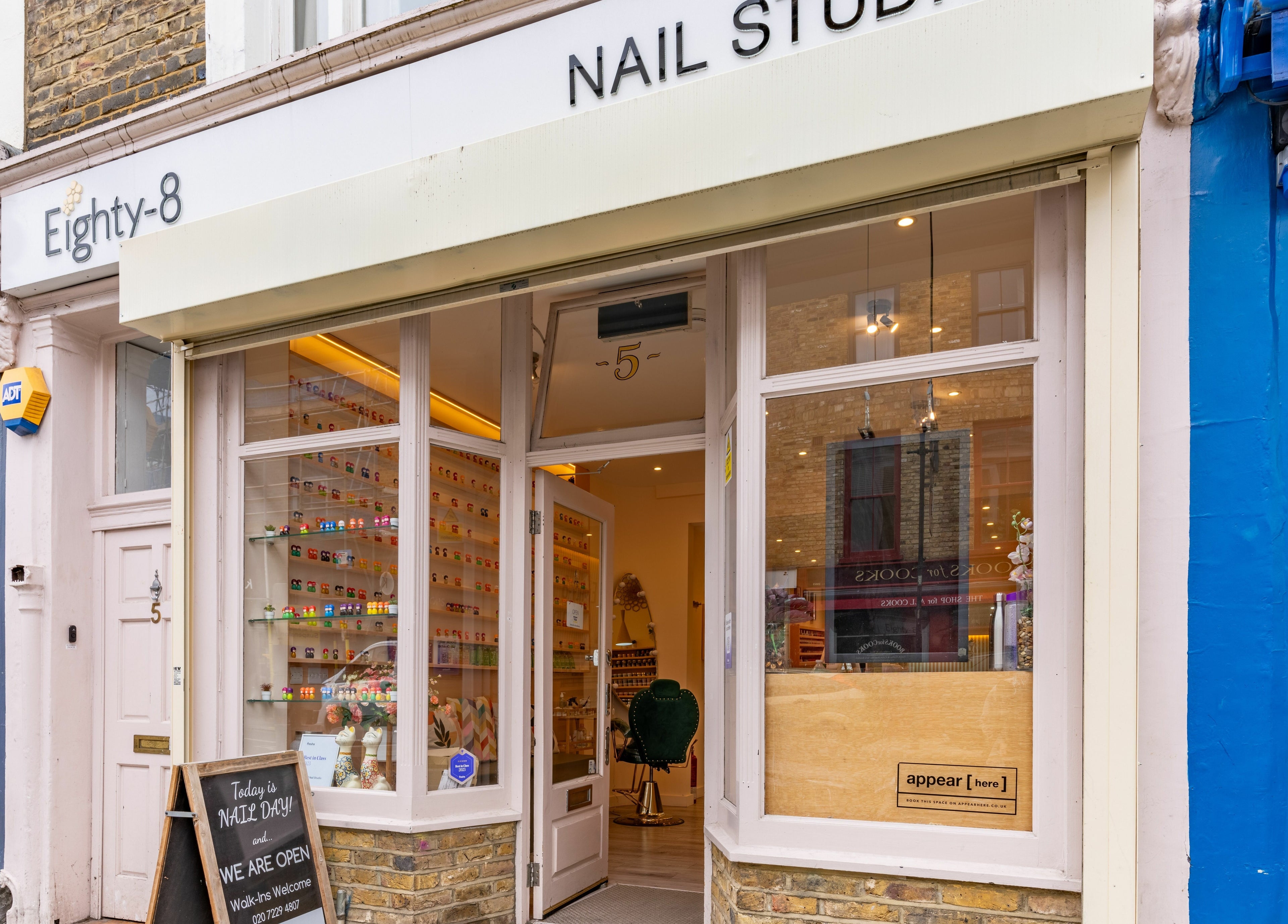 Entrance of Eighty-8 Notting Hill nail studio in London, England, GB showcasing a welcoming, stylish facade.