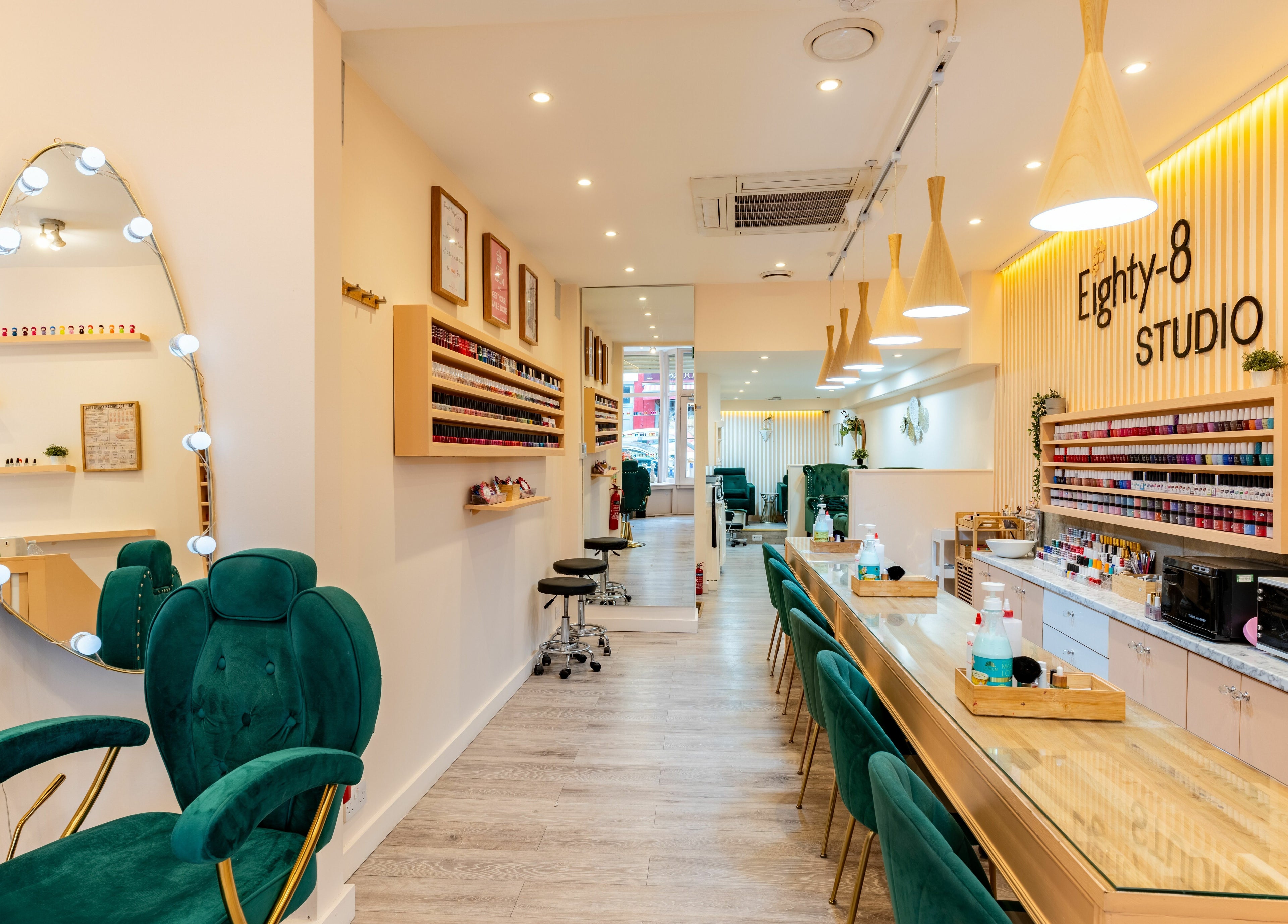 Eighty-8 Notting Hill nail salon interior in London, England, GB, featuring elegant decor and plush seating.