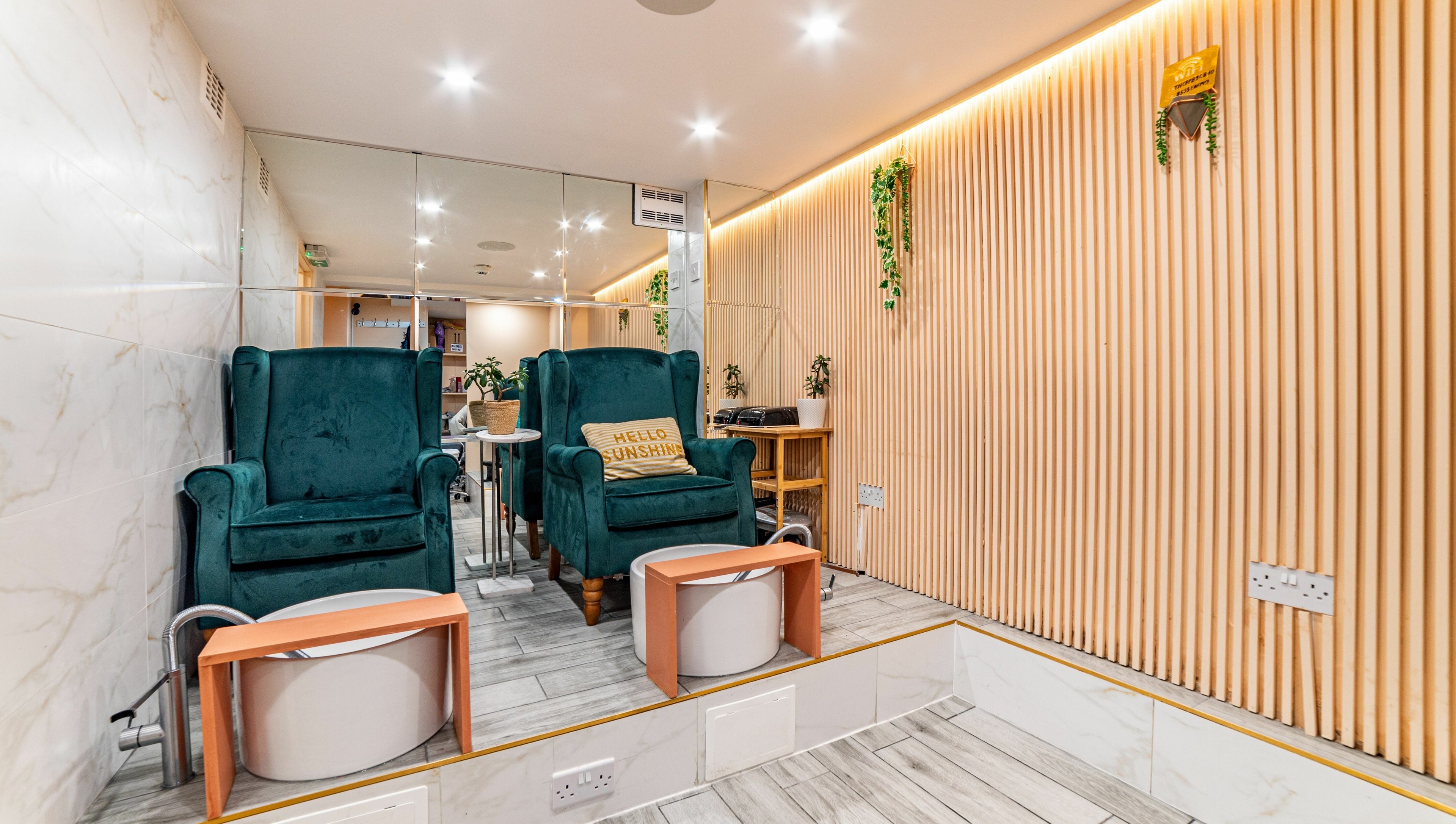 Elegant seating area at Eighty-8 Cale Street, London, England, GB with plush chairs and wooden accents.
