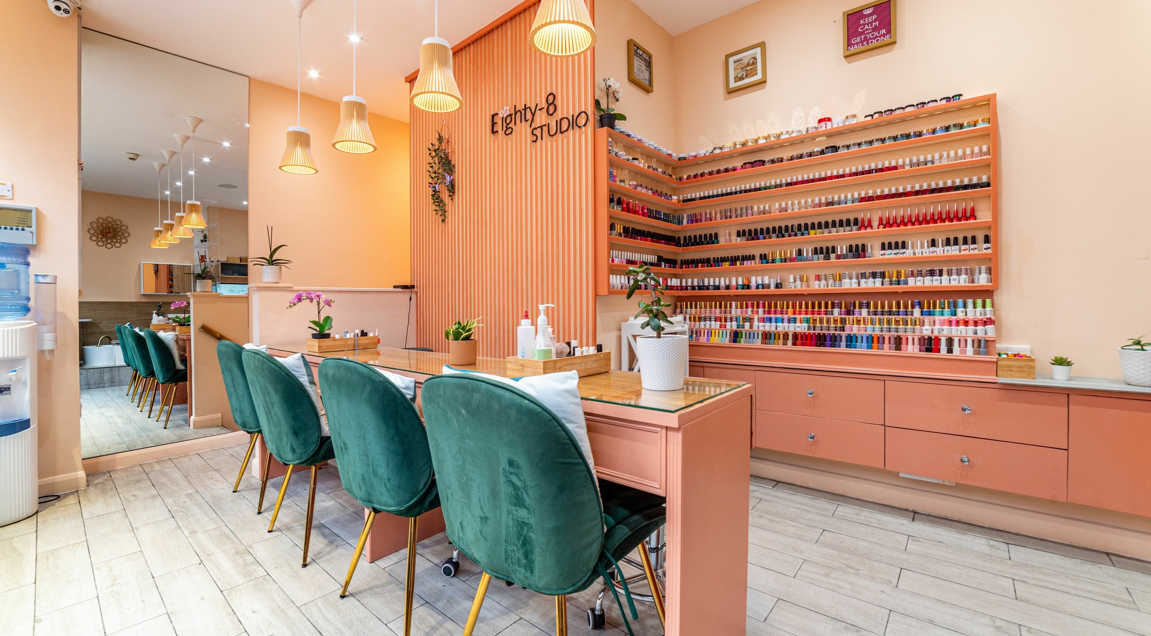Eighty-8 Cale Street in London, England, GB offers a chic nail salon with vibrant polish displays and plush seating.