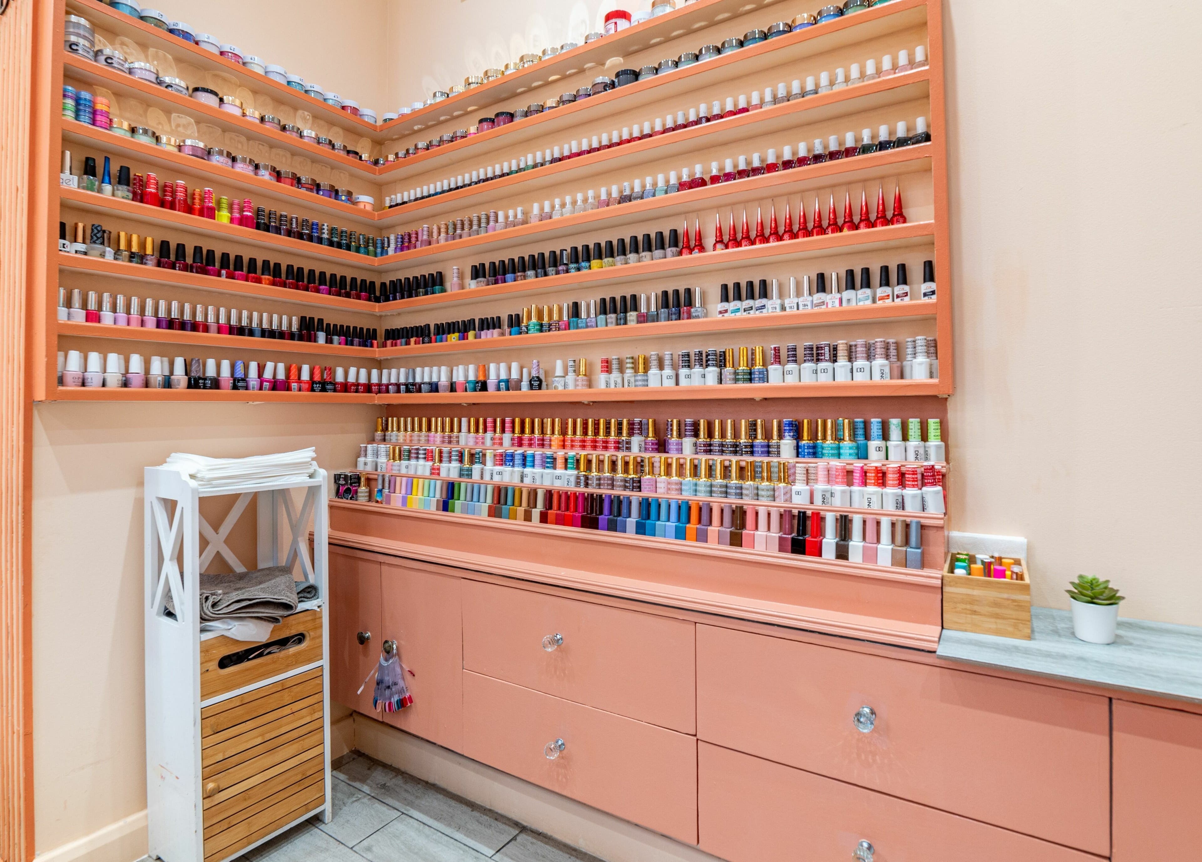 Vibrant nail polish display at Eighty-8 Cale Street, London, England, GB, showcasing wide color variety.