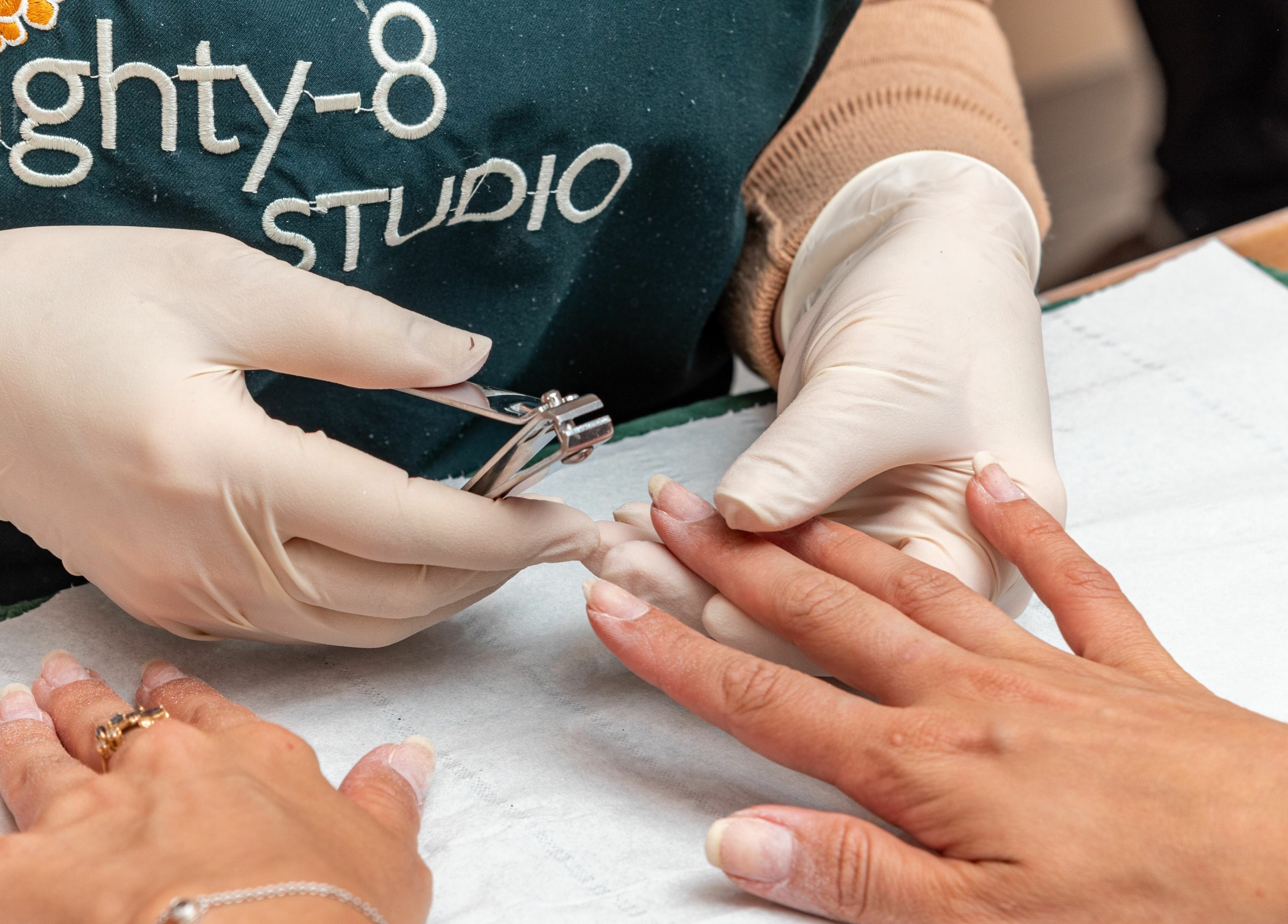 Nail technician providing a manicure at Eighty-8 Cale Street, London, England, GB.