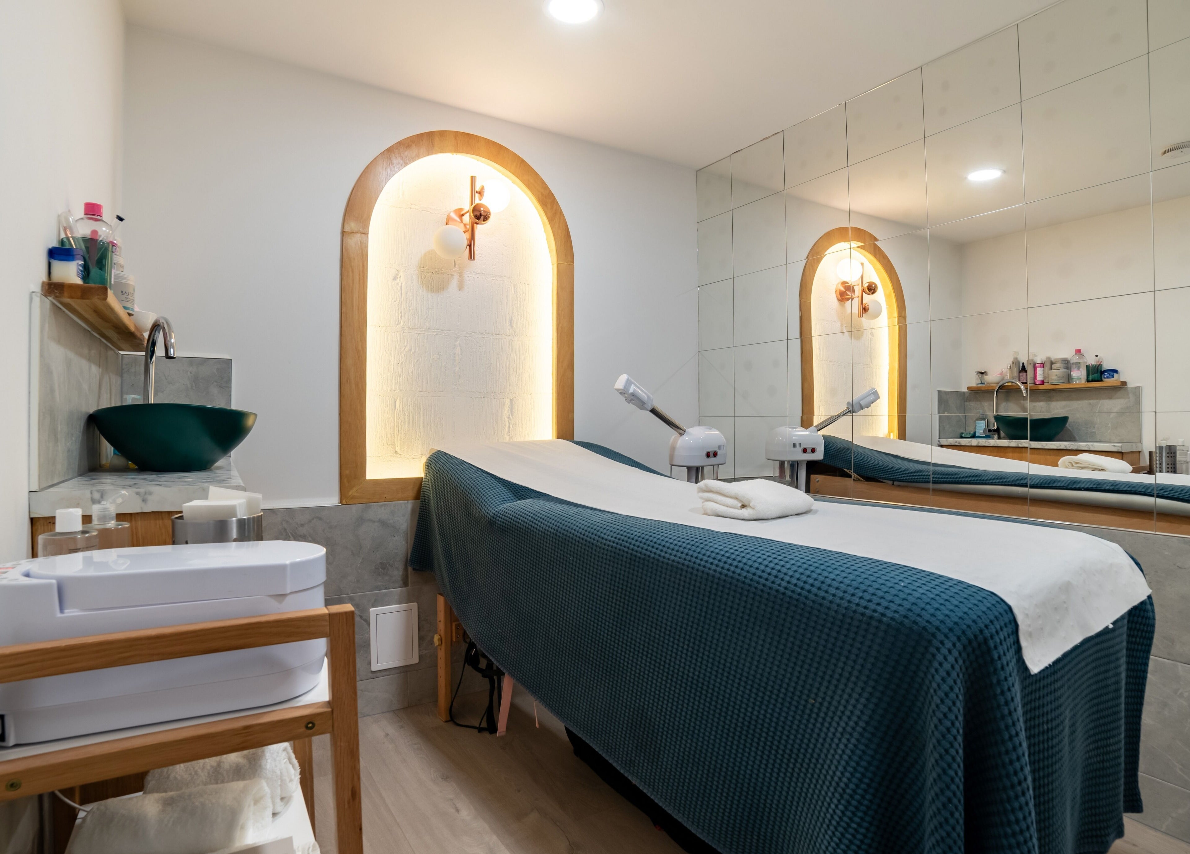 Elegant treatment room at Eighty-8 Covent Garden, London, England, GB with a luxurious massage table.