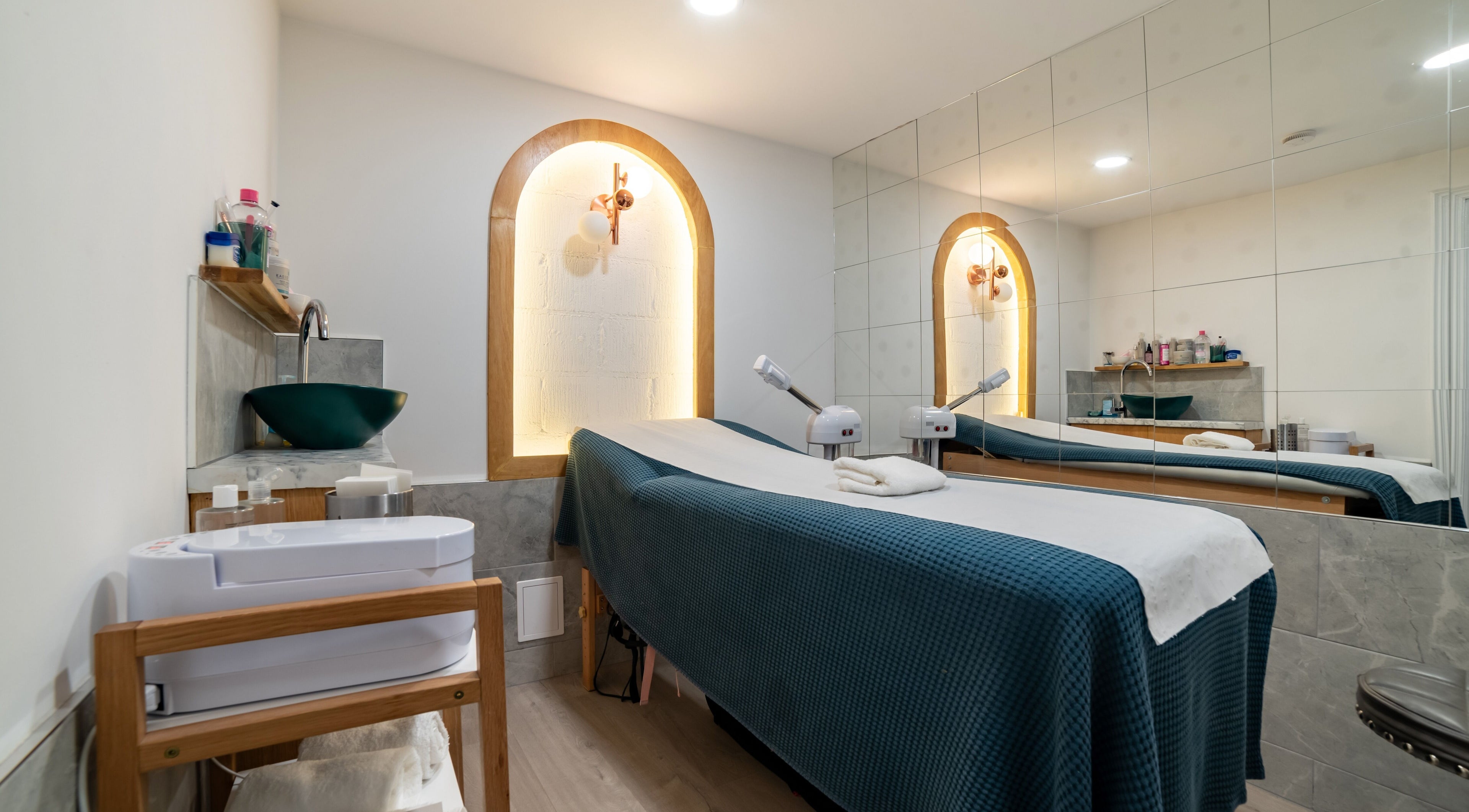 Elegant treatment room at Eighty-8 Covent Garden, London, England, GB with a luxurious massage table.