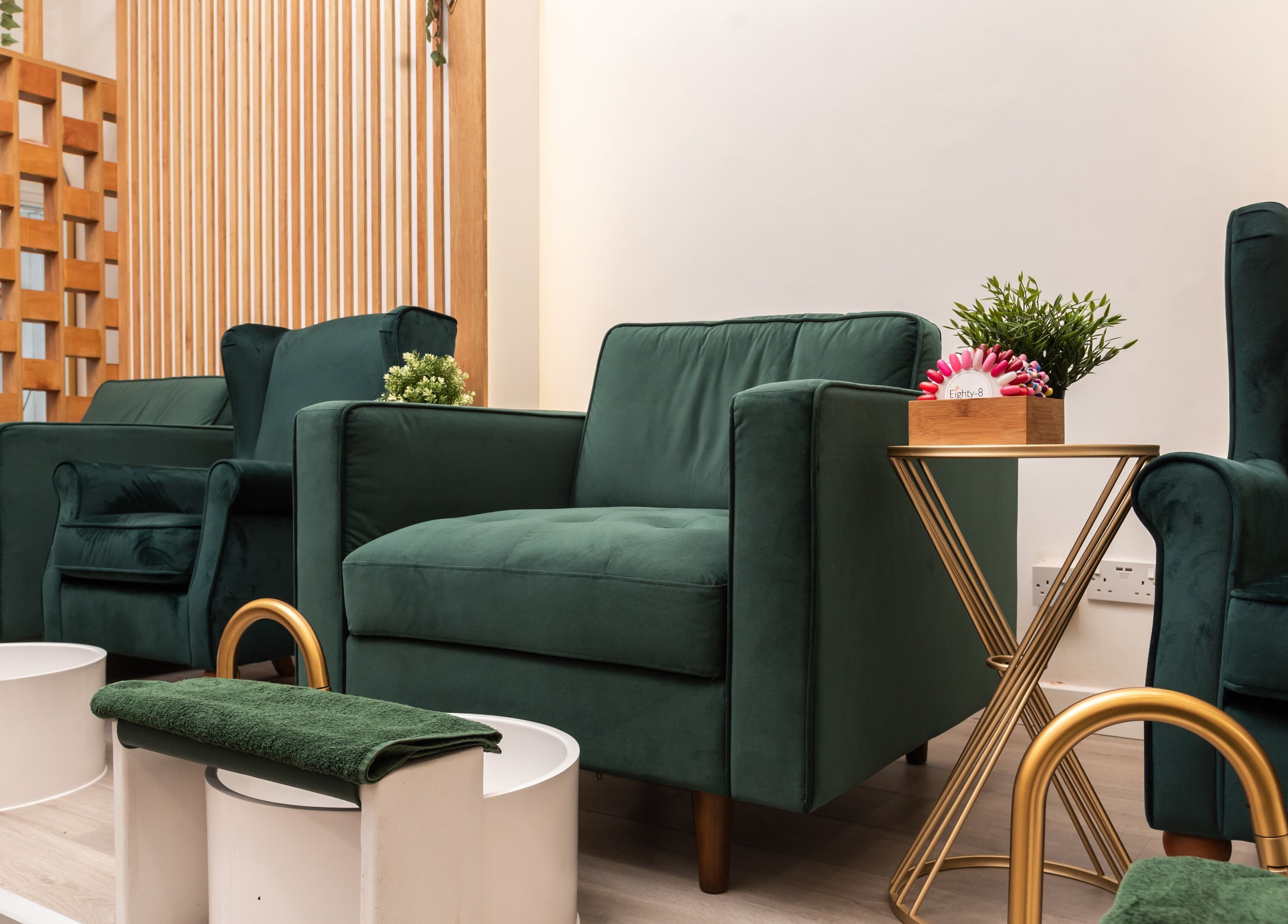 Chic green seating area of Eighty-8 Covent Garden, London, England, GB showcasing elegant decor.