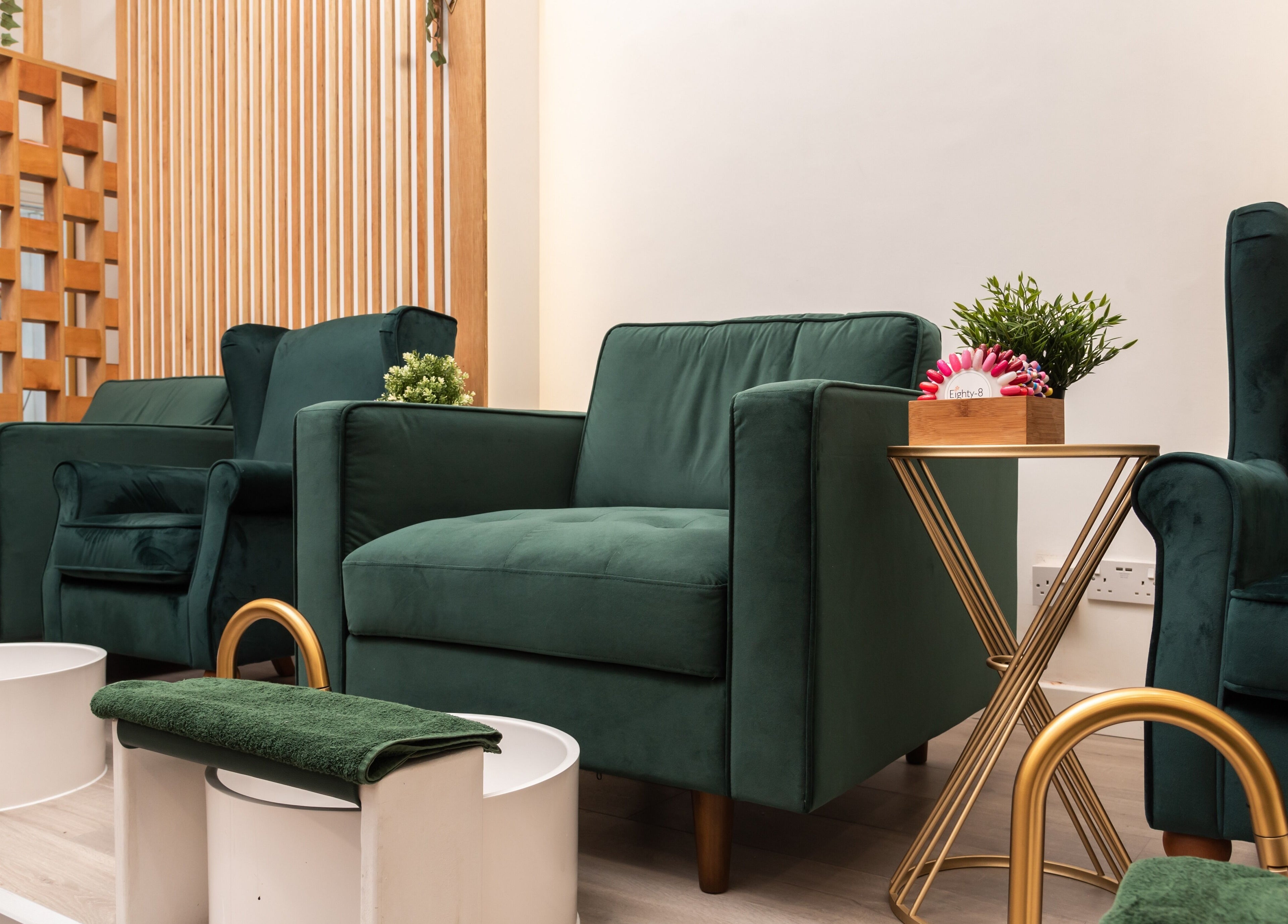 Chic green seating area of Eighty-8 Covent Garden, London, England, GB showcasing elegant decor.