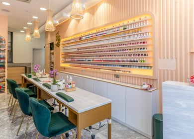 Stylish nail bar interior at Eighty-8 Kings Road in London, England, GB with sleek decor and vibrant polish display.