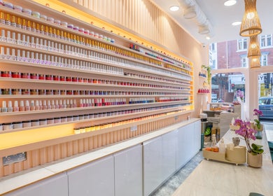Eighty-8 Kings Road in London, England, GB, showcasing a vibrant nail polish display and modern interior.