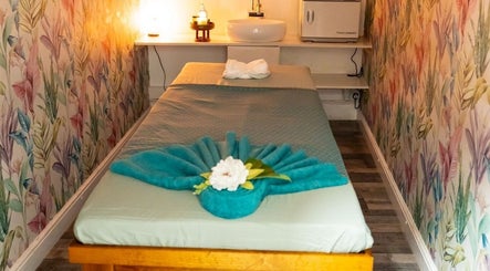 Relaxing massage room at Gold Star Thai Massage in London, England, GB with serene decor and soft lighting.