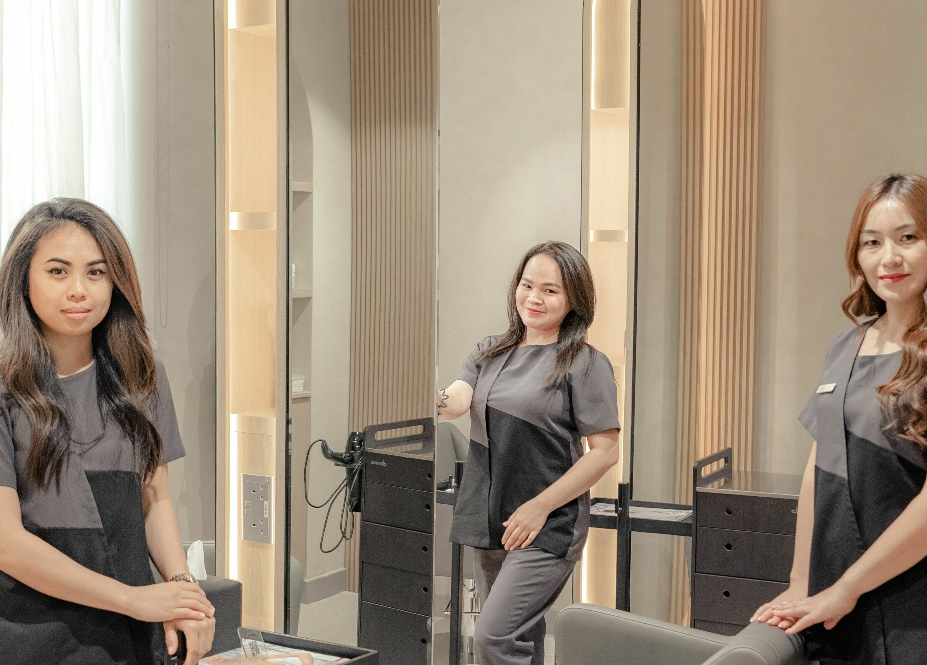 Professional therapists at Remedy Room in Abu Dhabi, AE, ready to provide wellness services.