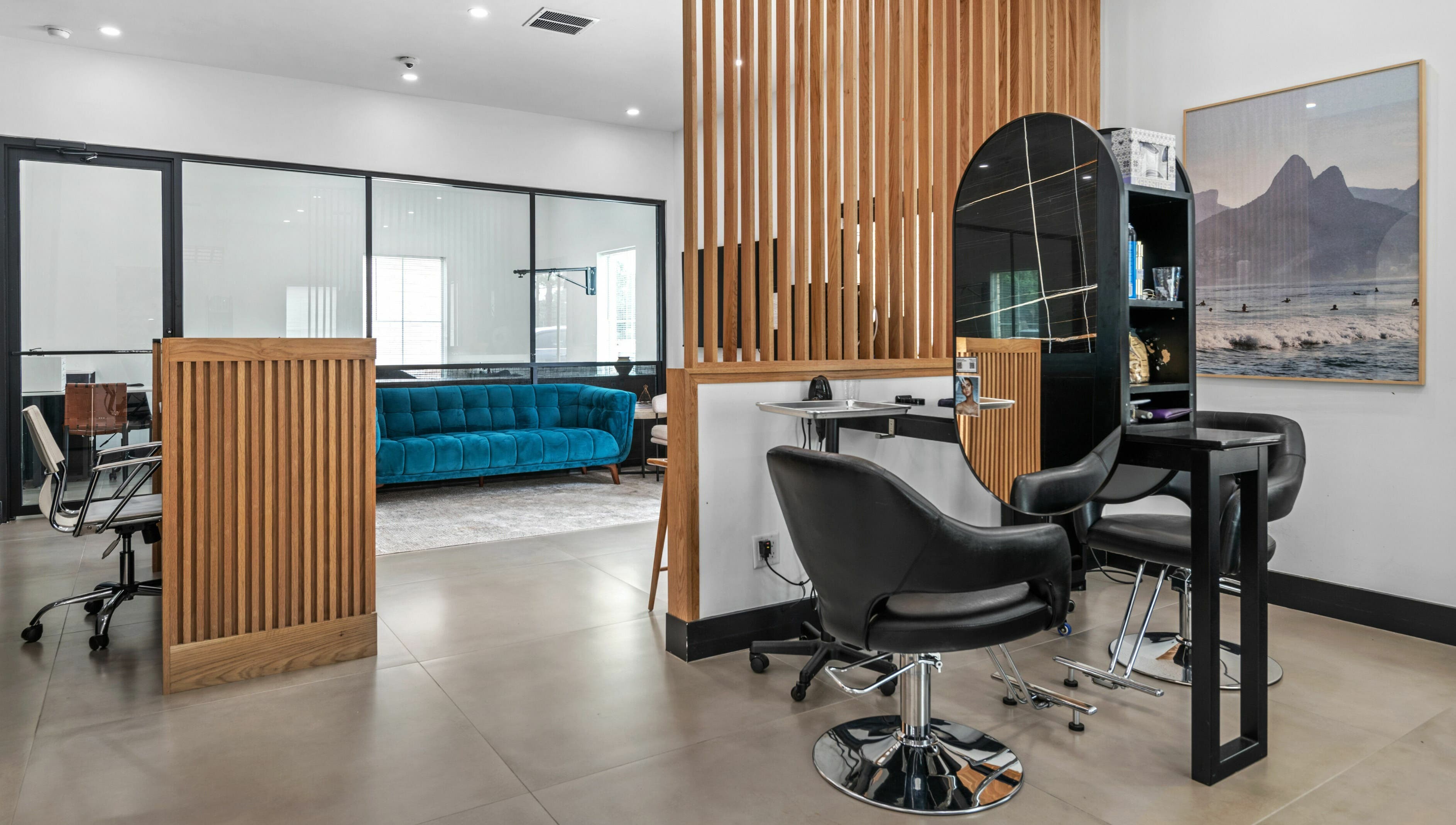 Modern interior of Mica Salon and Spa in Katy, Texas, US, featuring sleek chairs and elegant design elements.
