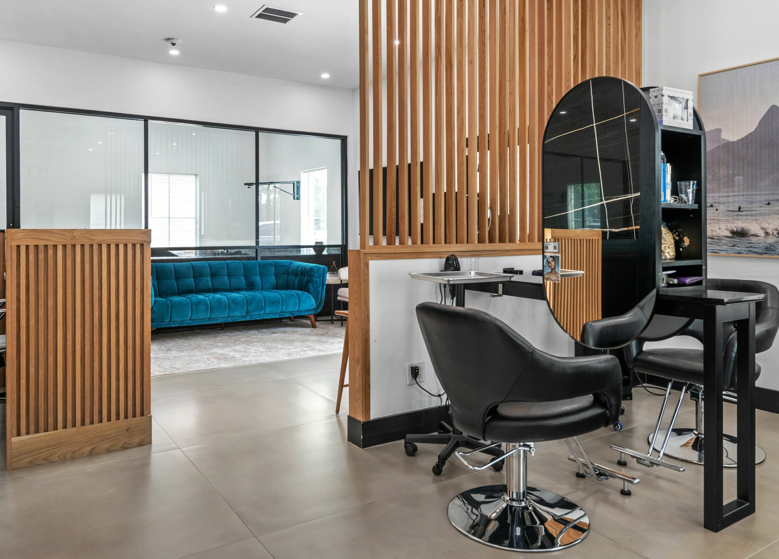 Modern interior of Mica Salon and Spa in Katy, Texas, US, featuring sleek chairs and elegant design elements.