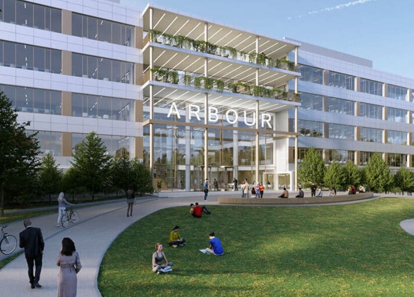 Modern Arbour building near SHAPINS Clinic | Reading, England, GB with people and bicycles.