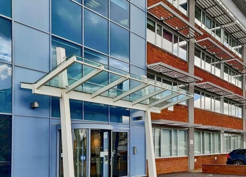 Exterior view of SHAPINS Clinic | Crawley showcasing modern glass facade in Crawley, England, GB.