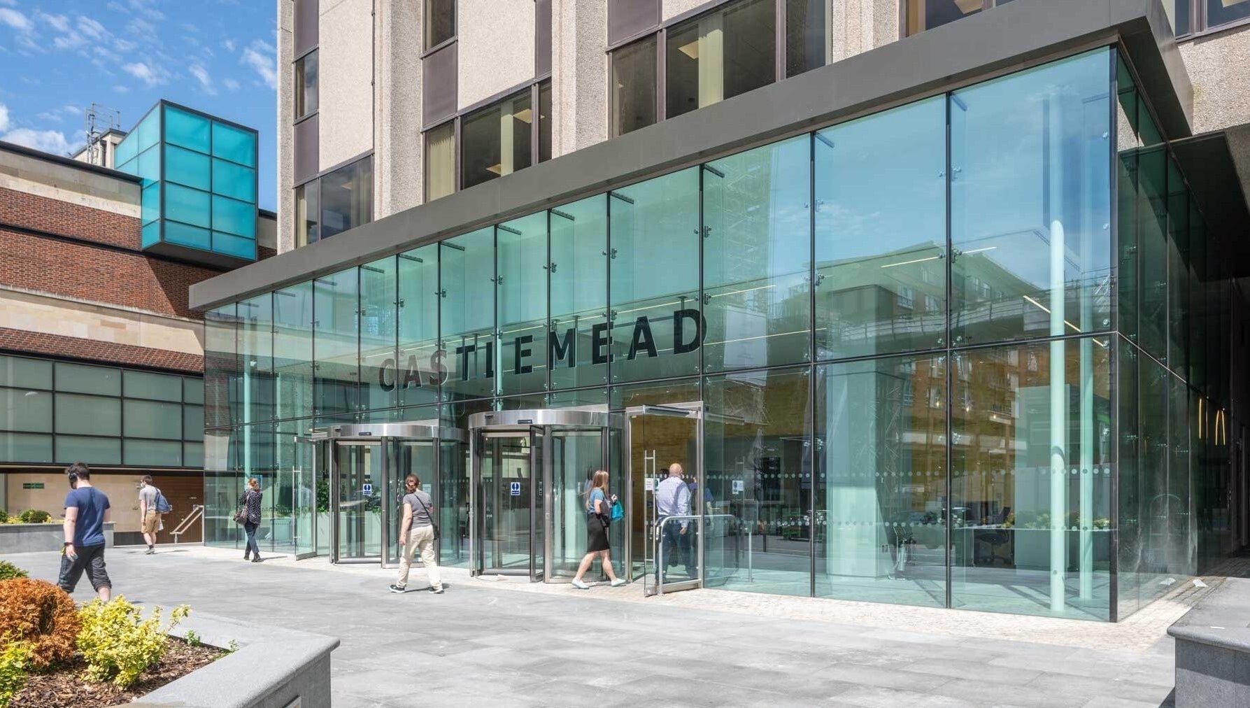 Modern entrance of SHAPINS Clinic | Bristol, located in glass-fronted building in Bristol, England, GB.