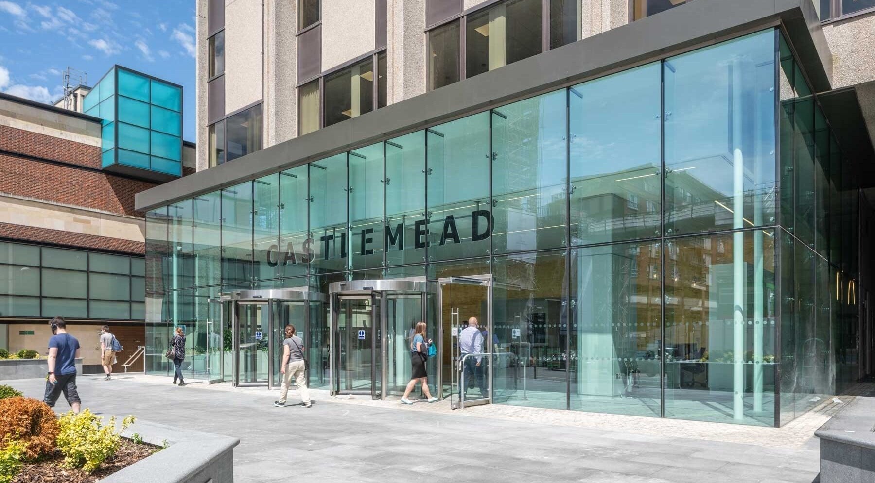 Modern entrance of SHAPINS Clinic | Bristol, located in glass-fronted building in Bristol, England, GB.