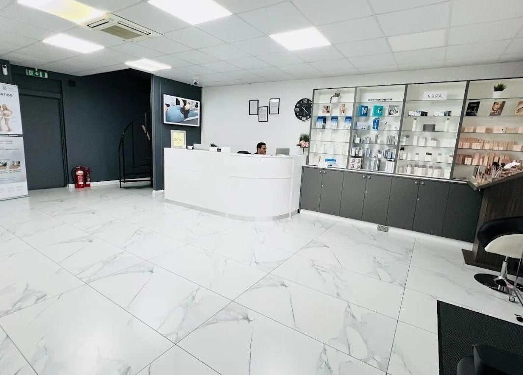 Elegant reception area at SHAPINS Clinic | Farnham, featuring modern decor and product displays in Farnham, England, GB.