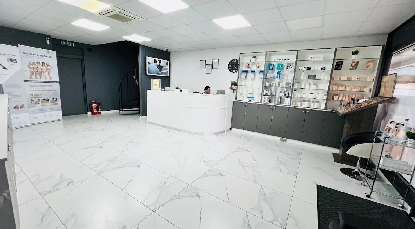Elegant reception area at SHAPINS Clinic | Farnham, featuring modern decor and product displays in Farnham, England, GB.