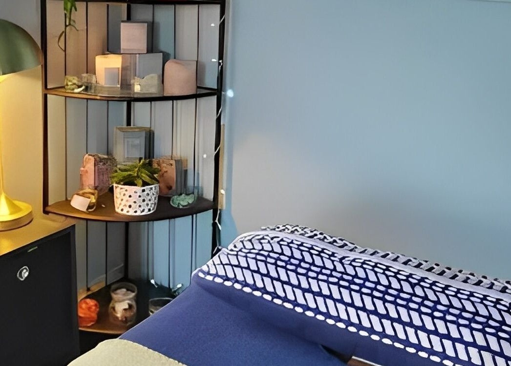 Cozy wellness space at Holistic Shed with Laura Kirk in Matlock, England, GB, featuring a soft lit lamp and decor.