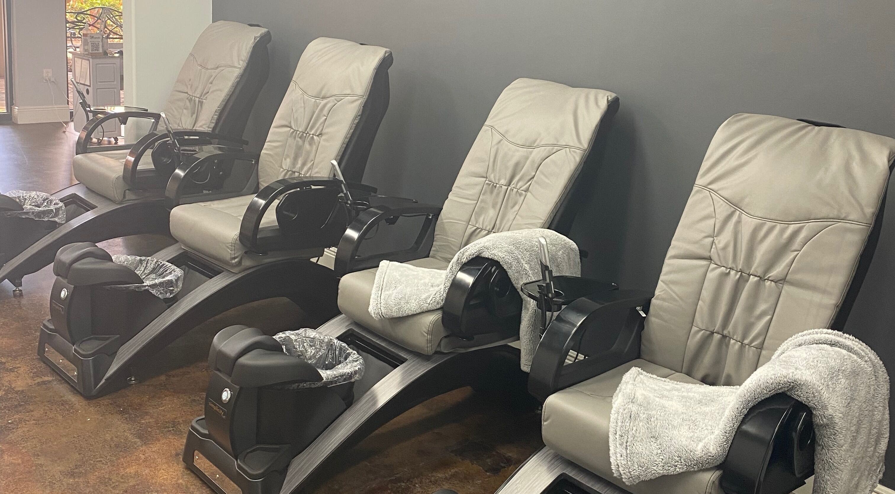 Luxurious pedicure chairs at Magnolia Nail Boutique & Spa in Fort Myers, Florida, US, ready for relaxation.